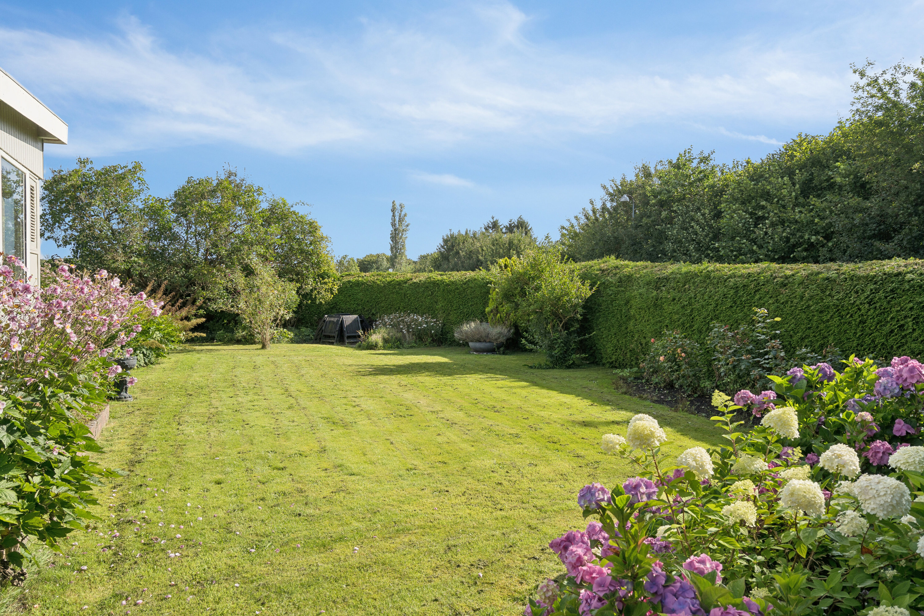 Fremhævet set fra haven billede i fuldskærmstilstand. Billede af Brandskov 35, Vråmose, 4654 Faxe Ladeplads