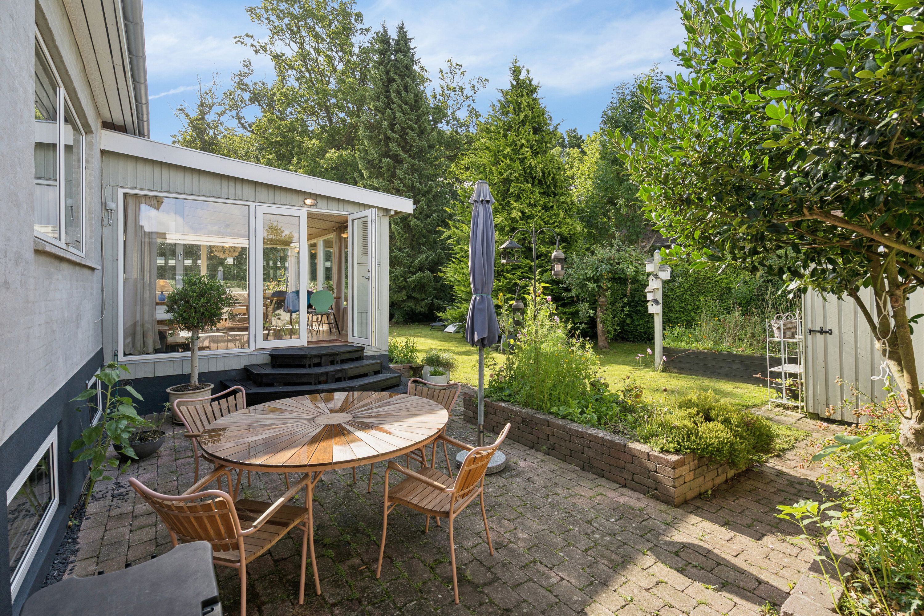 Fremhævet terrasse billede i fuldskærmstilstand. Billede af Brandskov 35, Vråmose, 4654 Faxe Ladeplads