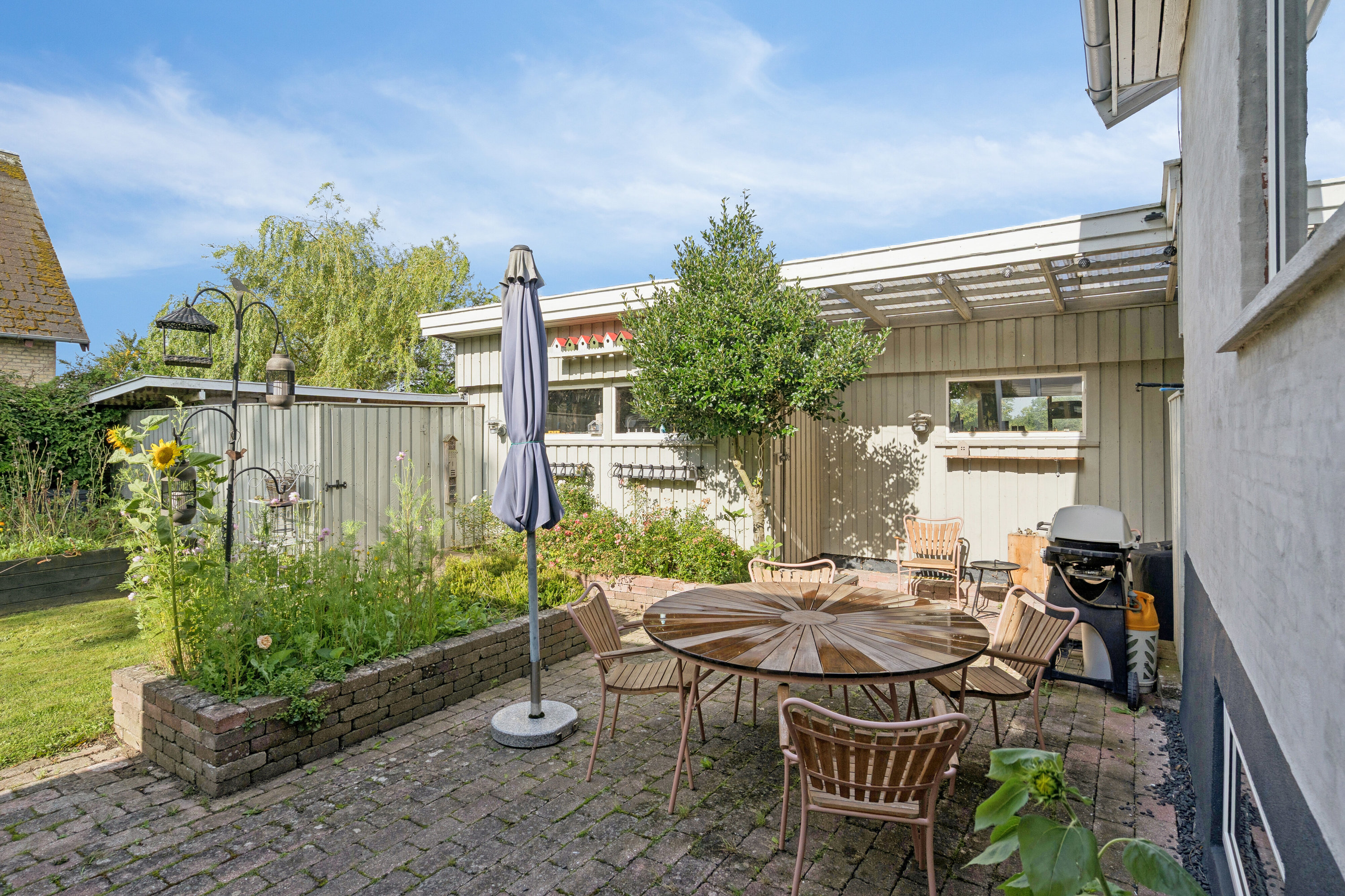 Fremhævet terrasse billede i fuldskærmstilstand. Billede af Brandskov 35, Vråmose, 4654 Faxe Ladeplads