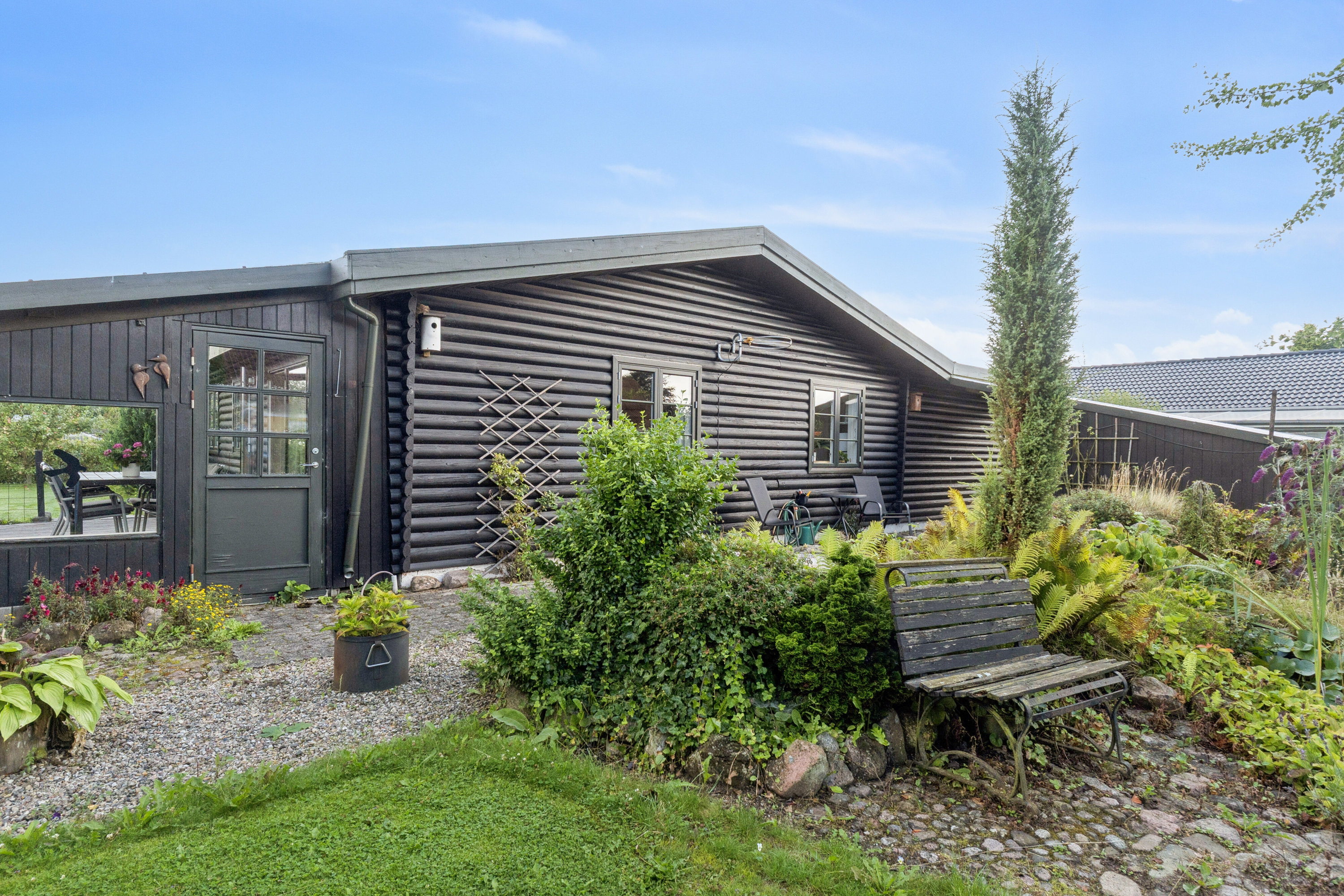 Fremhævet set fra haven billede i fuldskærmstilstand. Billede af Haugstedvænget 3, Kirkeby, 5771 Stenstrup