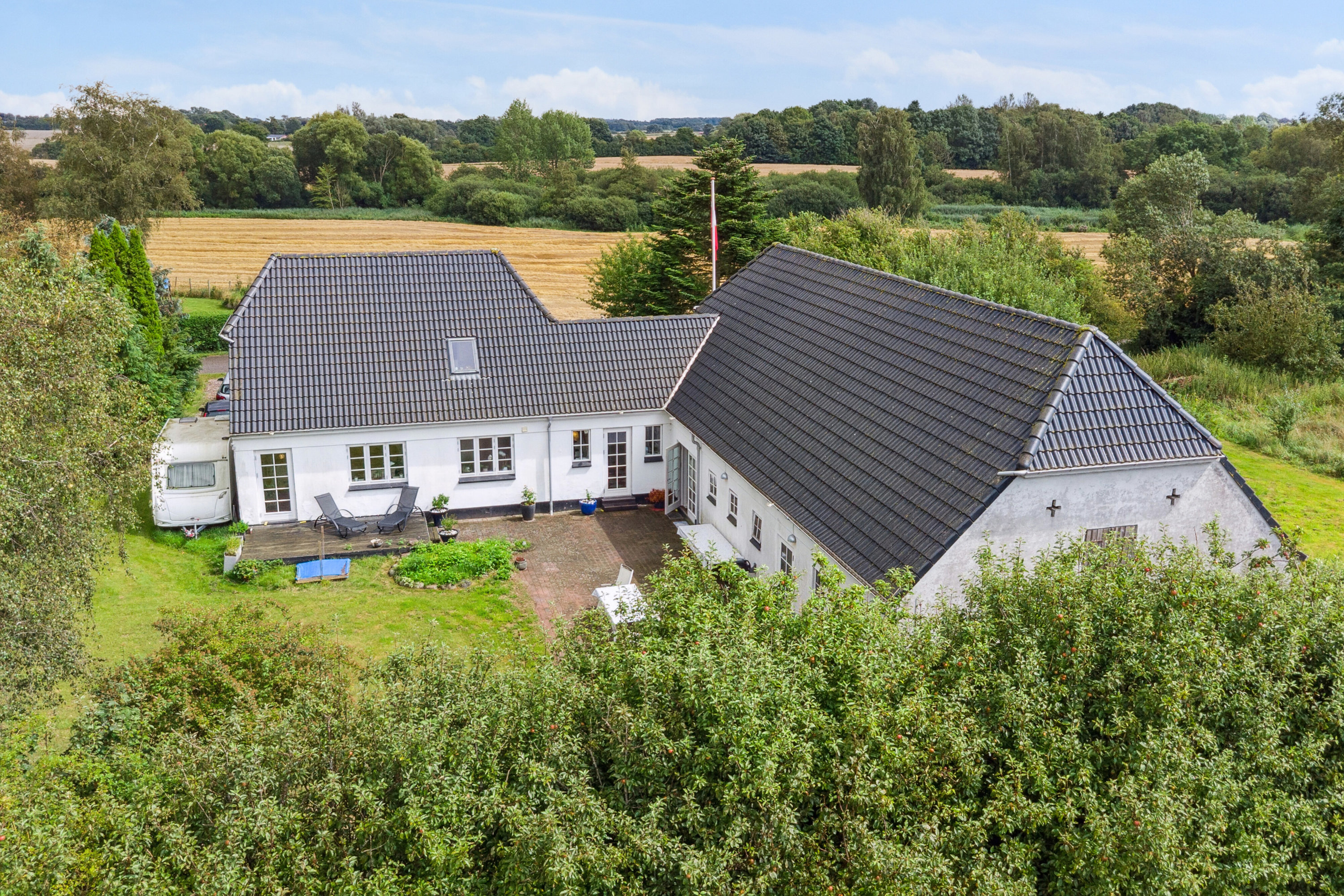 Fremhævet set fra haven billede i fuldskærmstilstand. Billede af Møllegyden 37, Gamby, 5471 Søndersø