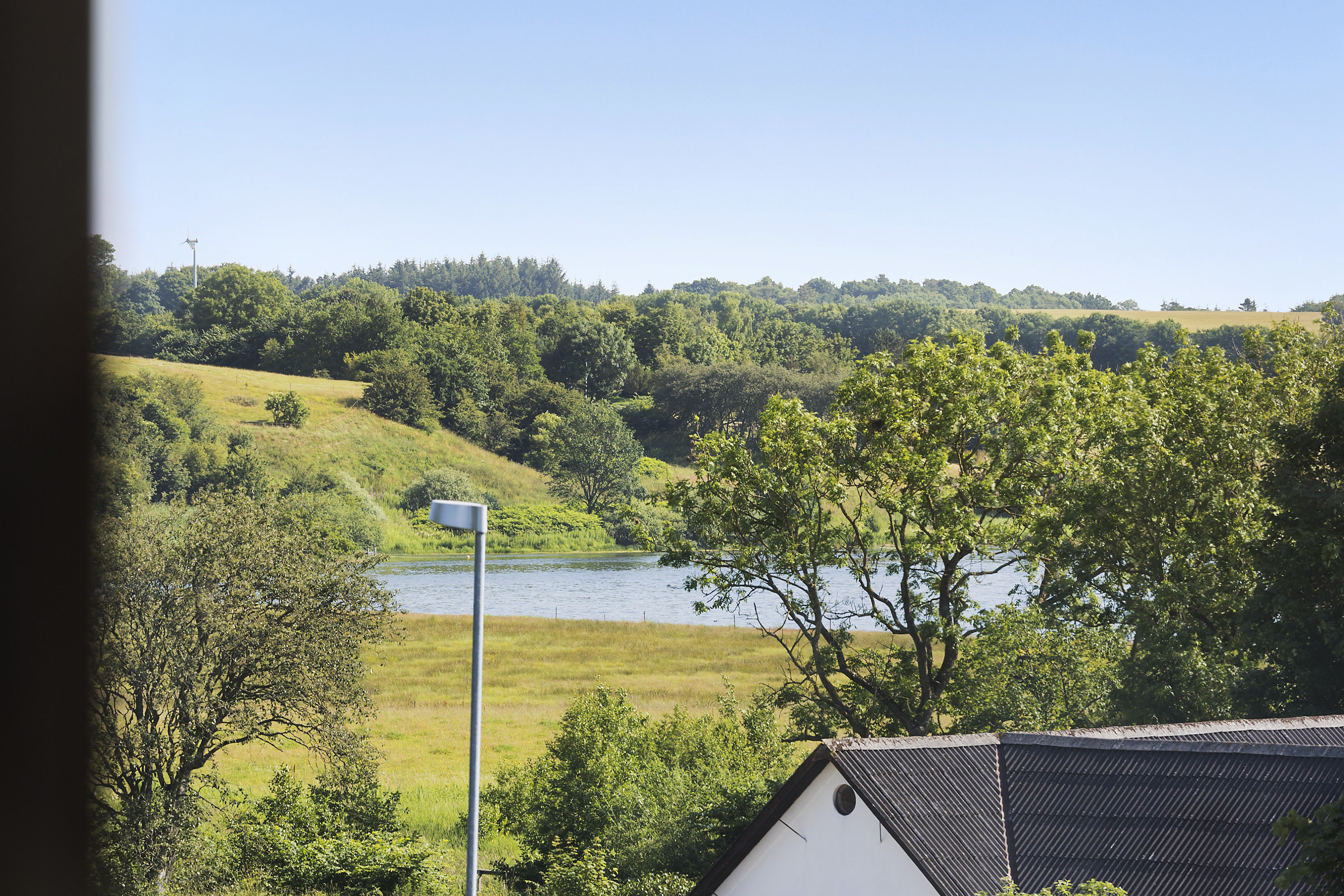 Fremhævet udsigt billede i fuldskærmstilstand. Billede af Glenstrup Søvej 8, Holmgård, 8990 Fårup