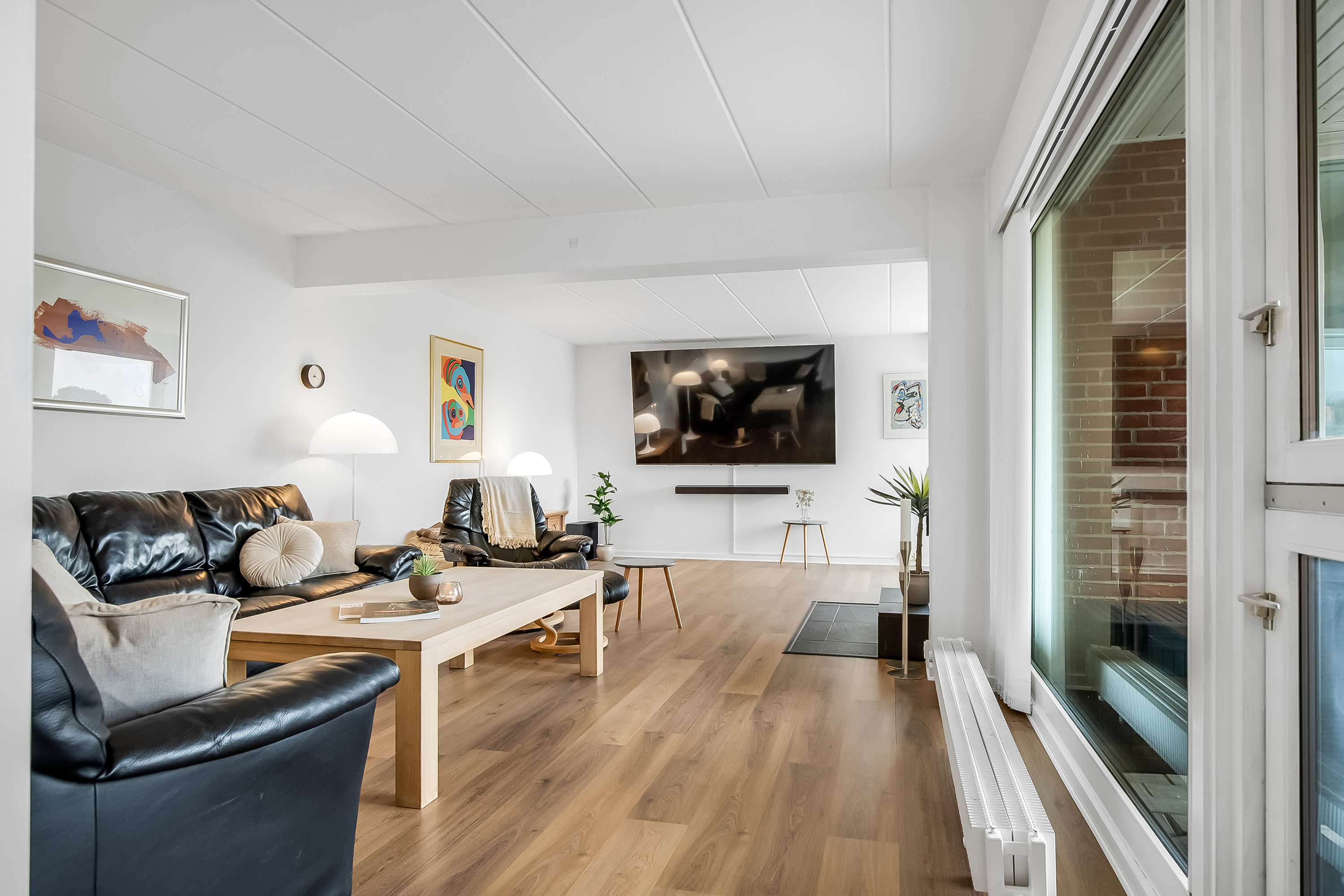 Fremhævet stue billede i fuldskærmstilstand. Billede af Agtrup Midtskovvej 115, Agtrup, 6091 Bjert