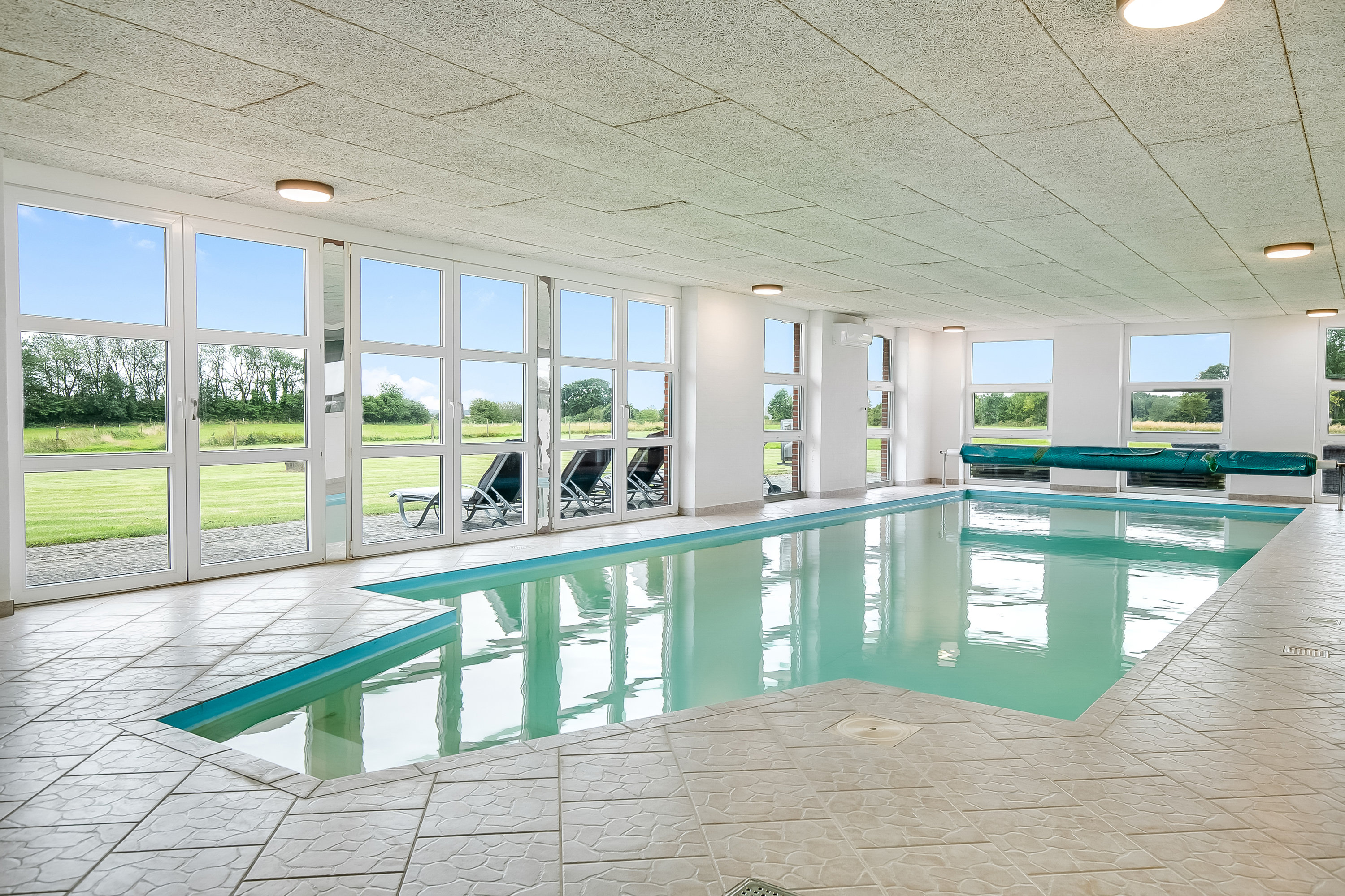 Fremhævet pool billede i fuldskærmstilstand. Billede af Agtrup Midtskovvej 115, Agtrup, 6091 Bjert