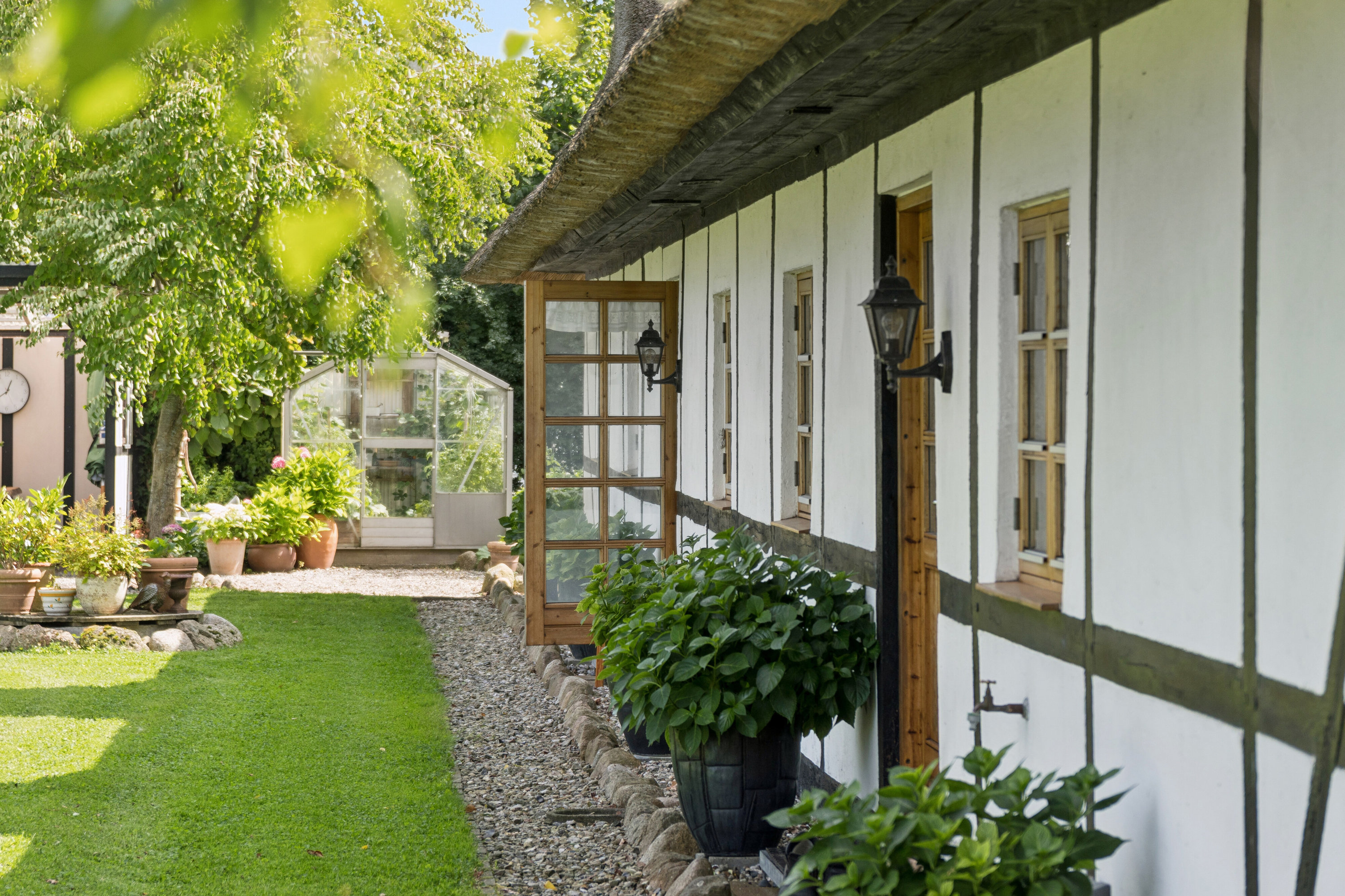 Fremhævet set fra haven billede i fuldskærmstilstand. Billede af Vesterskovvej 11, Bårse, 4750 Lundby