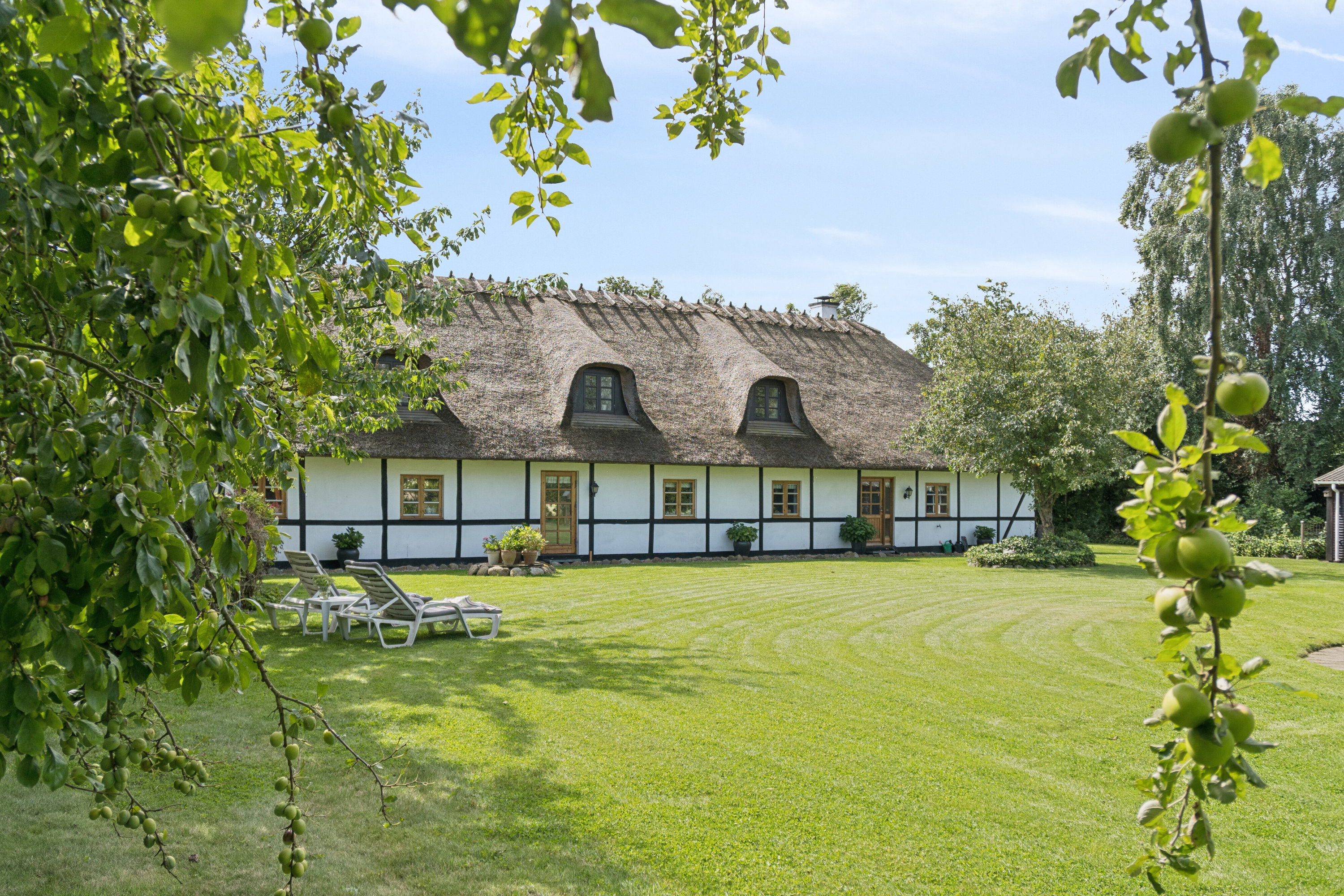 Fremhævet set fra haven billede i fuldskærmstilstand. Billede af Vesterskovvej 11, Bårse, 4750 Lundby