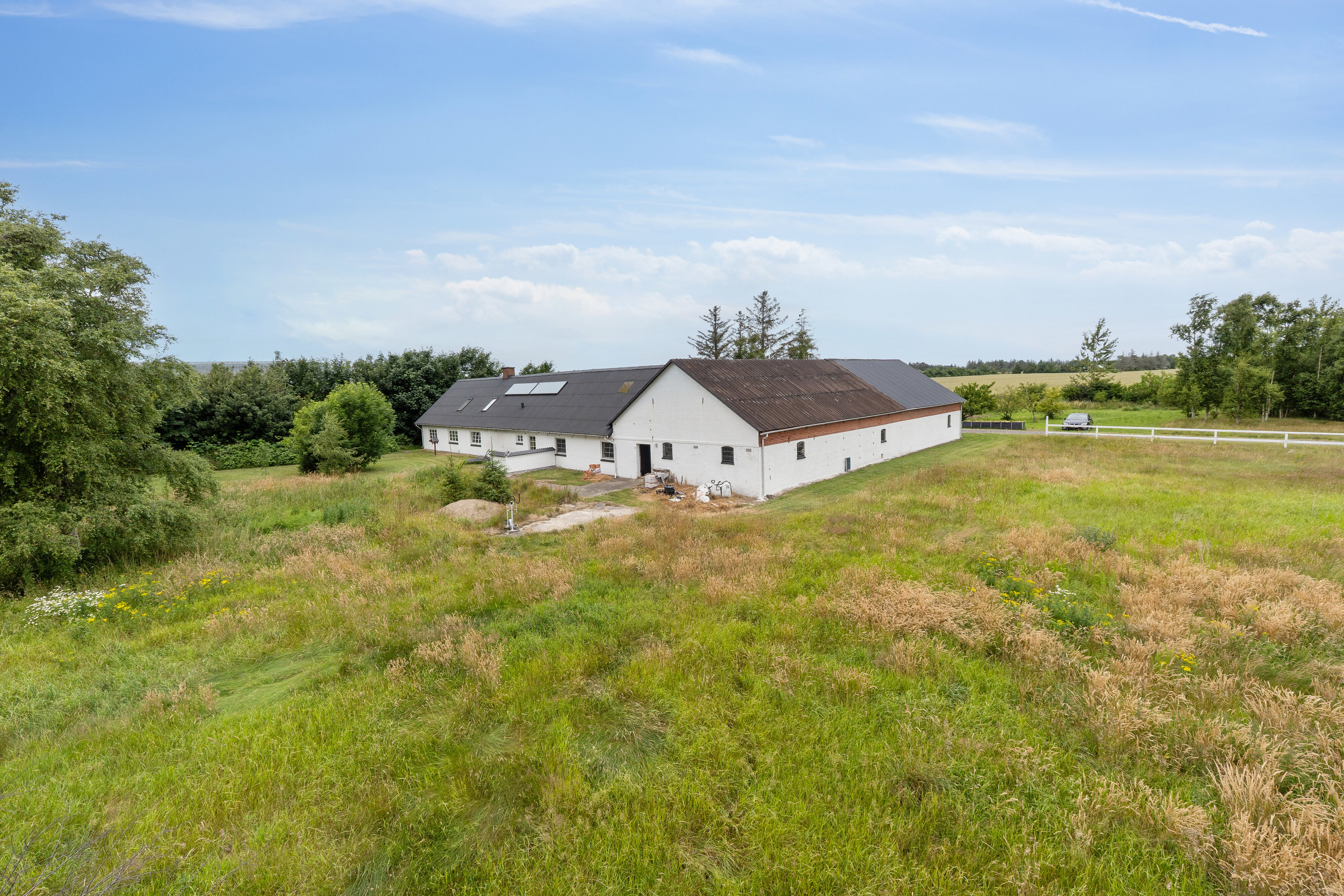 Fremhævet set fra haven billede i fuldskærmstilstand. Billede af Sørig Engvej 26, Sørig, 9881 Bindslev