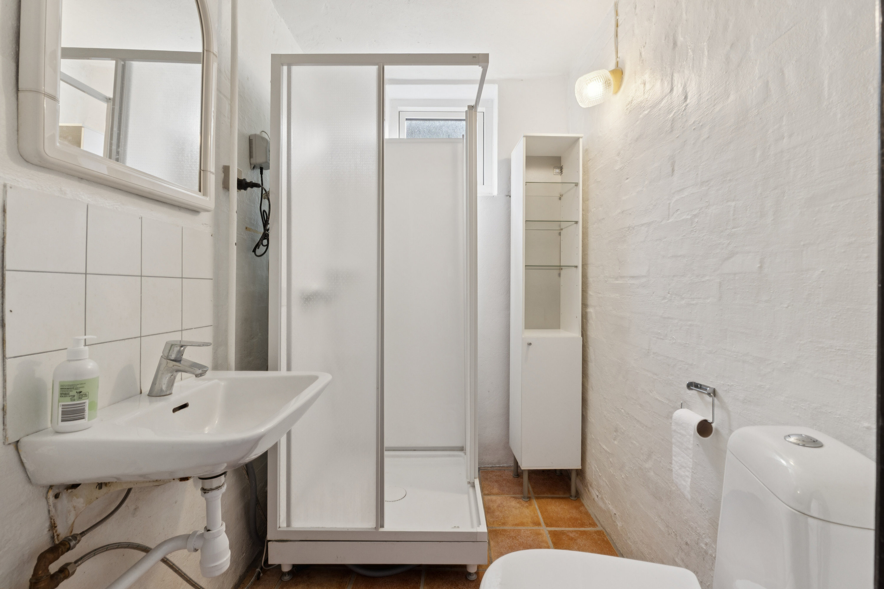 Fremhævet badeværelse billede i fuldskærmstilstand. Billede af Købkesvej 57, 5230 Odense M