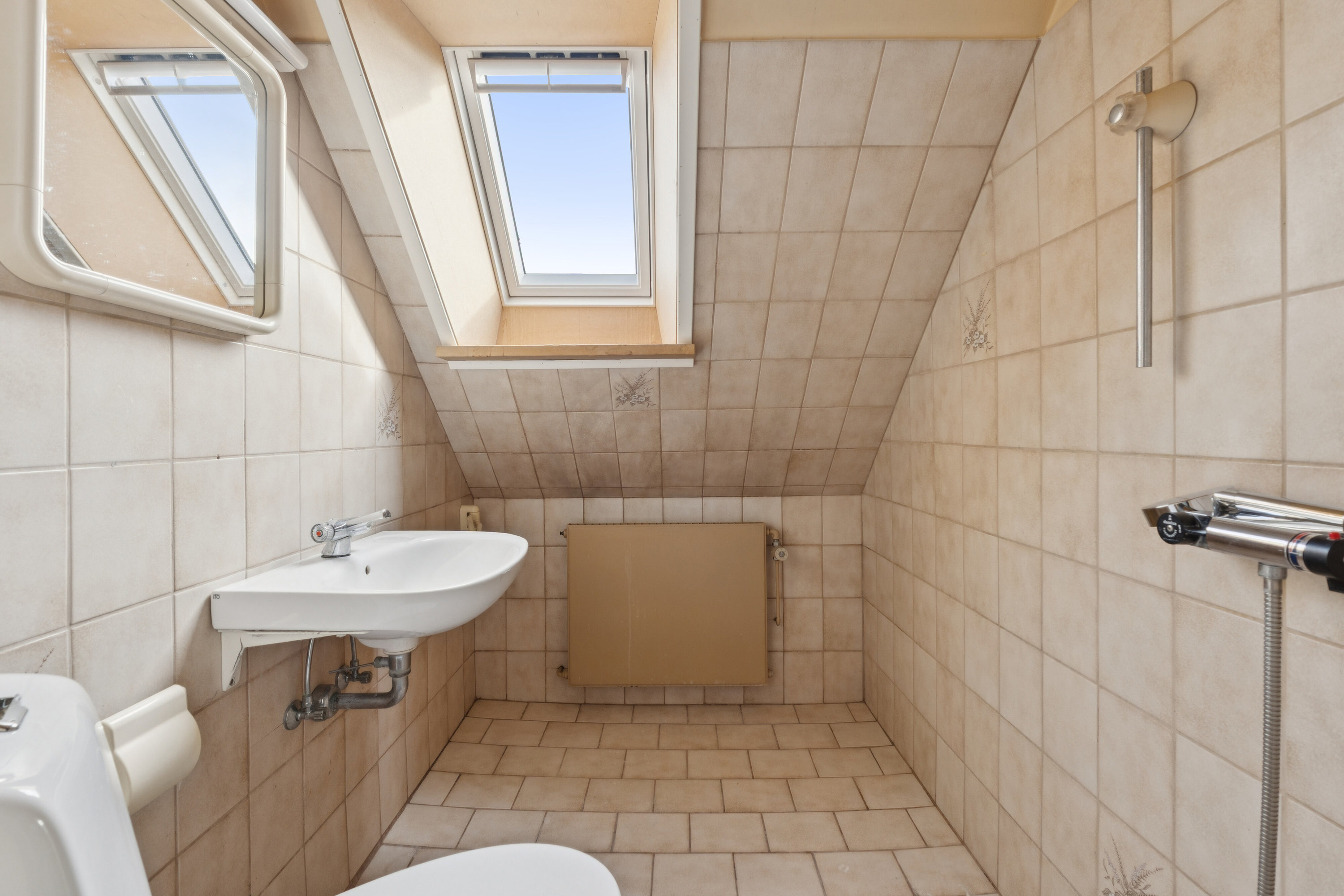 Fremhævet badeværelse billede i fuldskærmstilstand. Billede af Købkesvej 57, 5230 Odense M