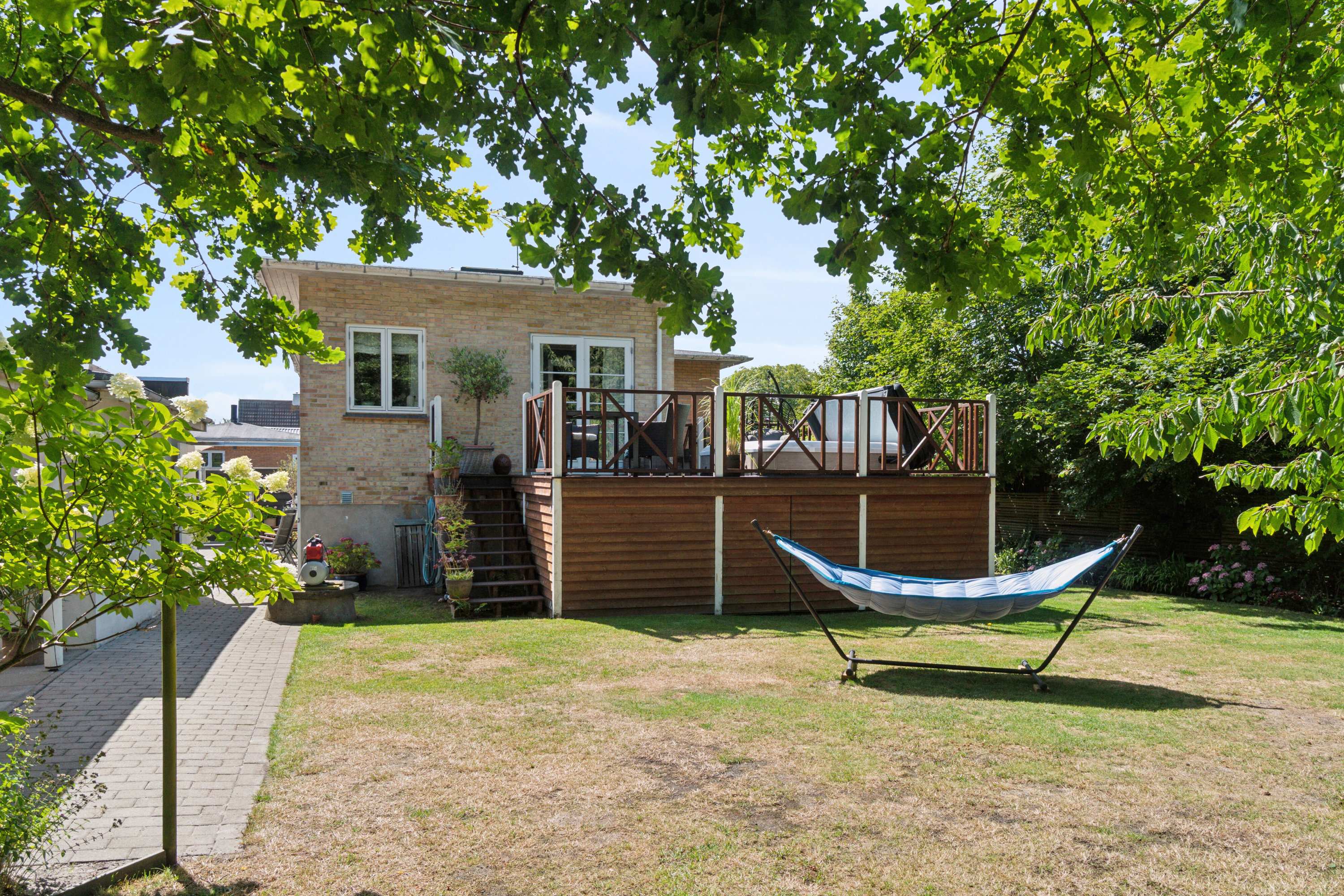 Fremhævet set fra haven billede i fuldskærmstilstand. Billede af Nordskovvej 5, Rønne, 3700 Rønne