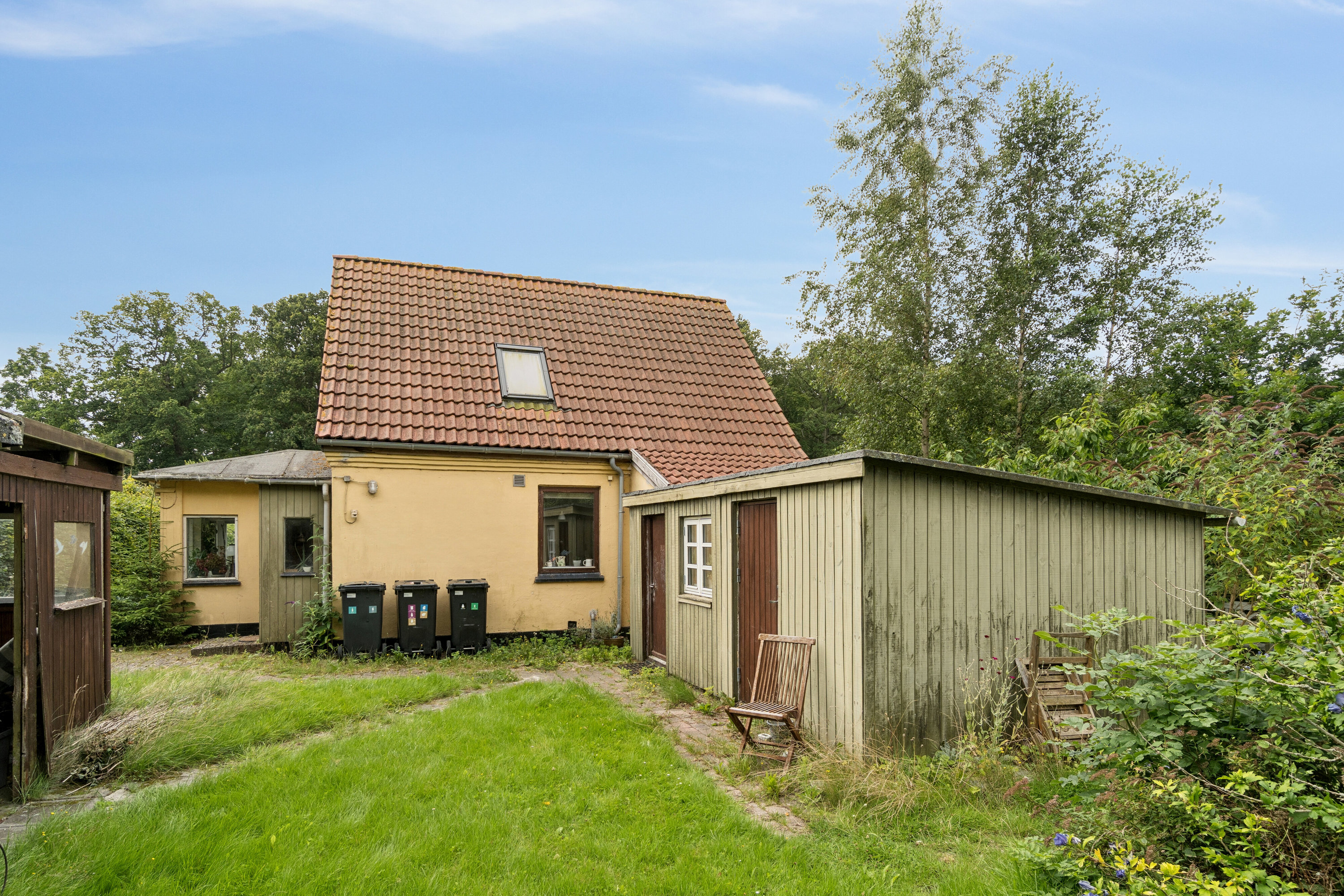 Fremhævet set fra haven billede i fuldskærmstilstand. Billede af Kissendrupvej 1B, Brandskov, 4654 Faxe Ladeplads