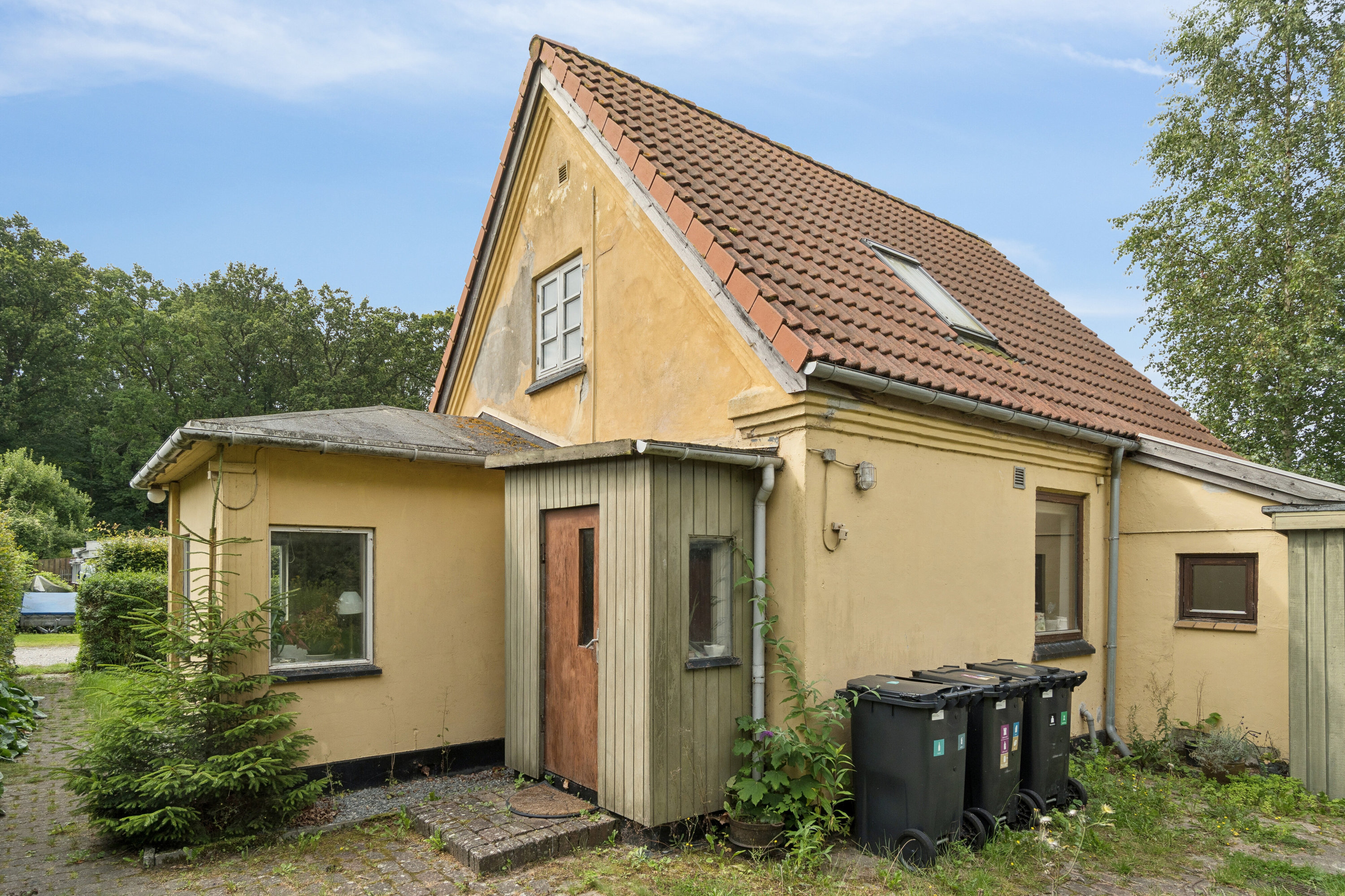 Fremhævet set fra haven billede i fuldskærmstilstand. Billede af Kissendrupvej 1B, Brandskov, 4654 Faxe Ladeplads