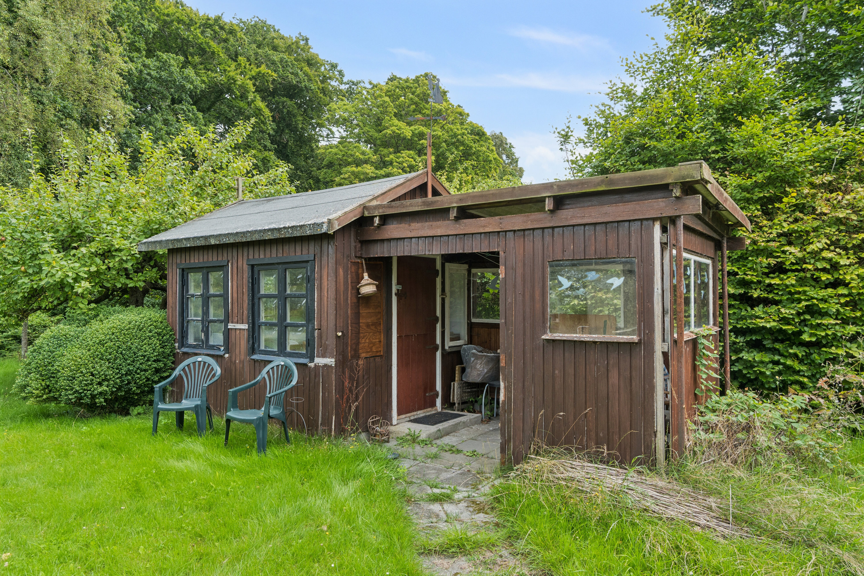 Fremhævet set fra vejen billede i fuldskærmstilstand. Billede af Kissendrupvej 1B, Brandskov, 4654 Faxe Ladeplads