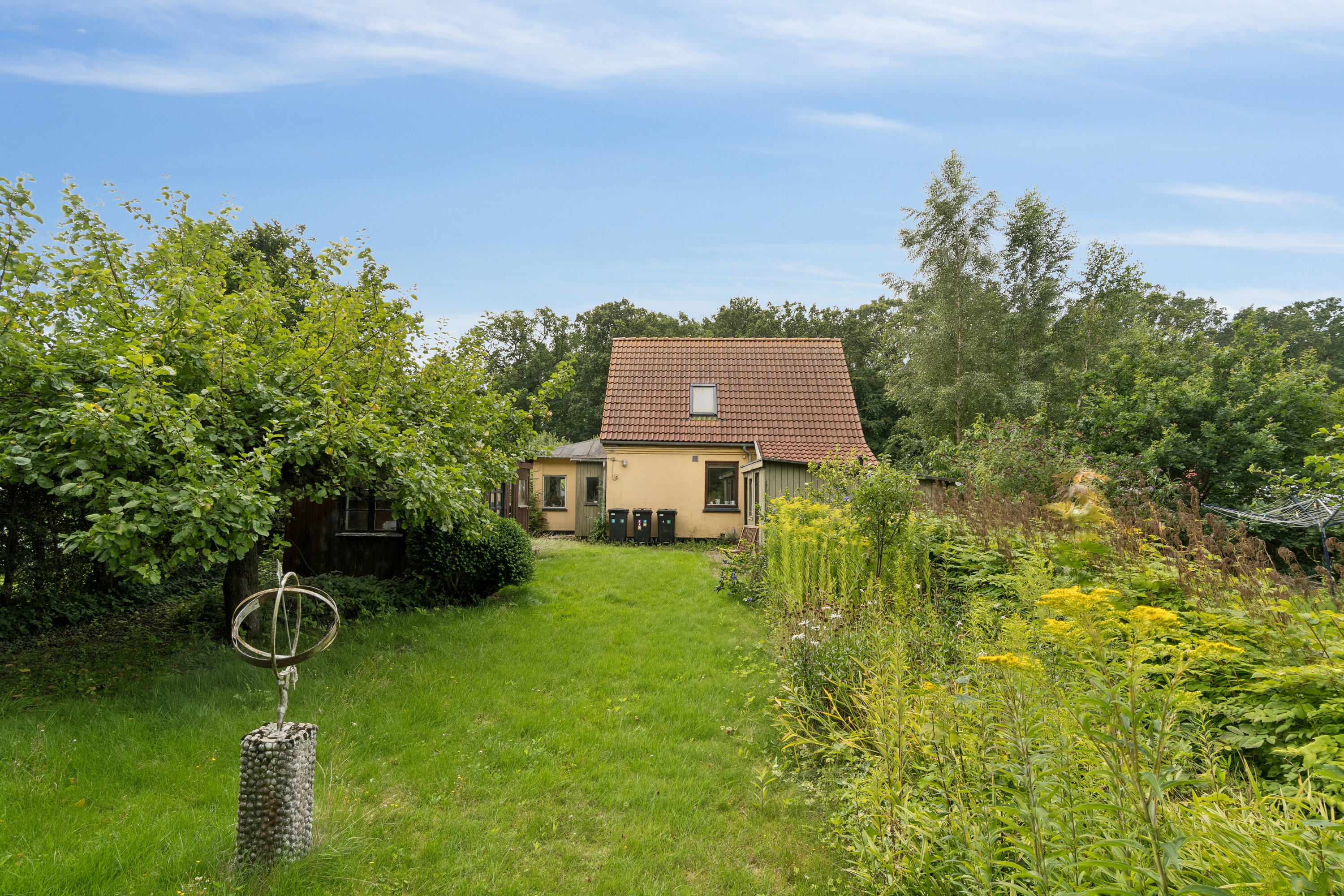 Fremhævet set fra haven billede i fuldskærmstilstand. Billede af Kissendrupvej 1B, Brandskov, 4654 Faxe Ladeplads