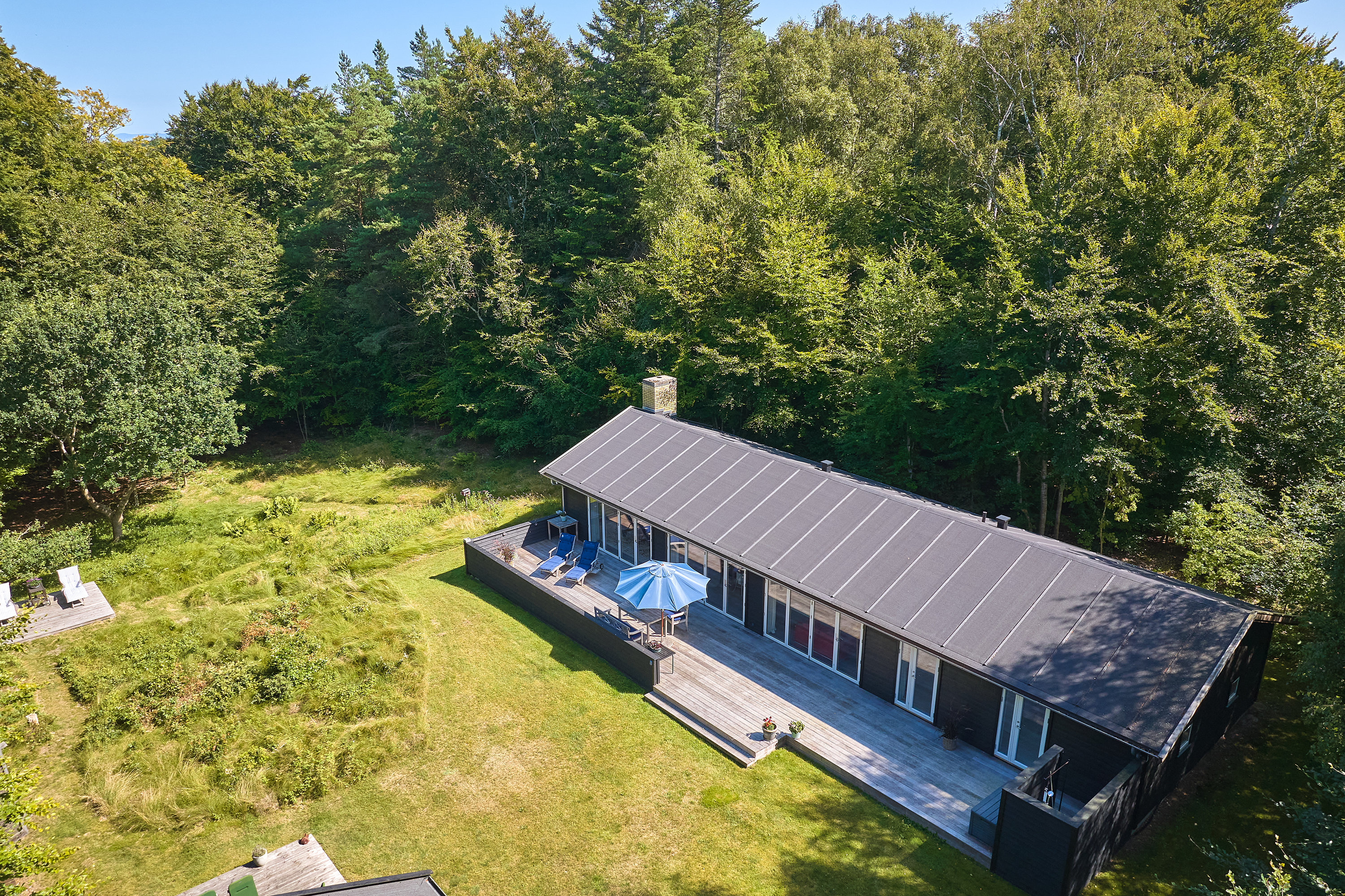 Fremhævet ejendommen billede i fuldskærmstilstand. Billede af Skovbakken 3, Rågeleje, 3210 Vejby