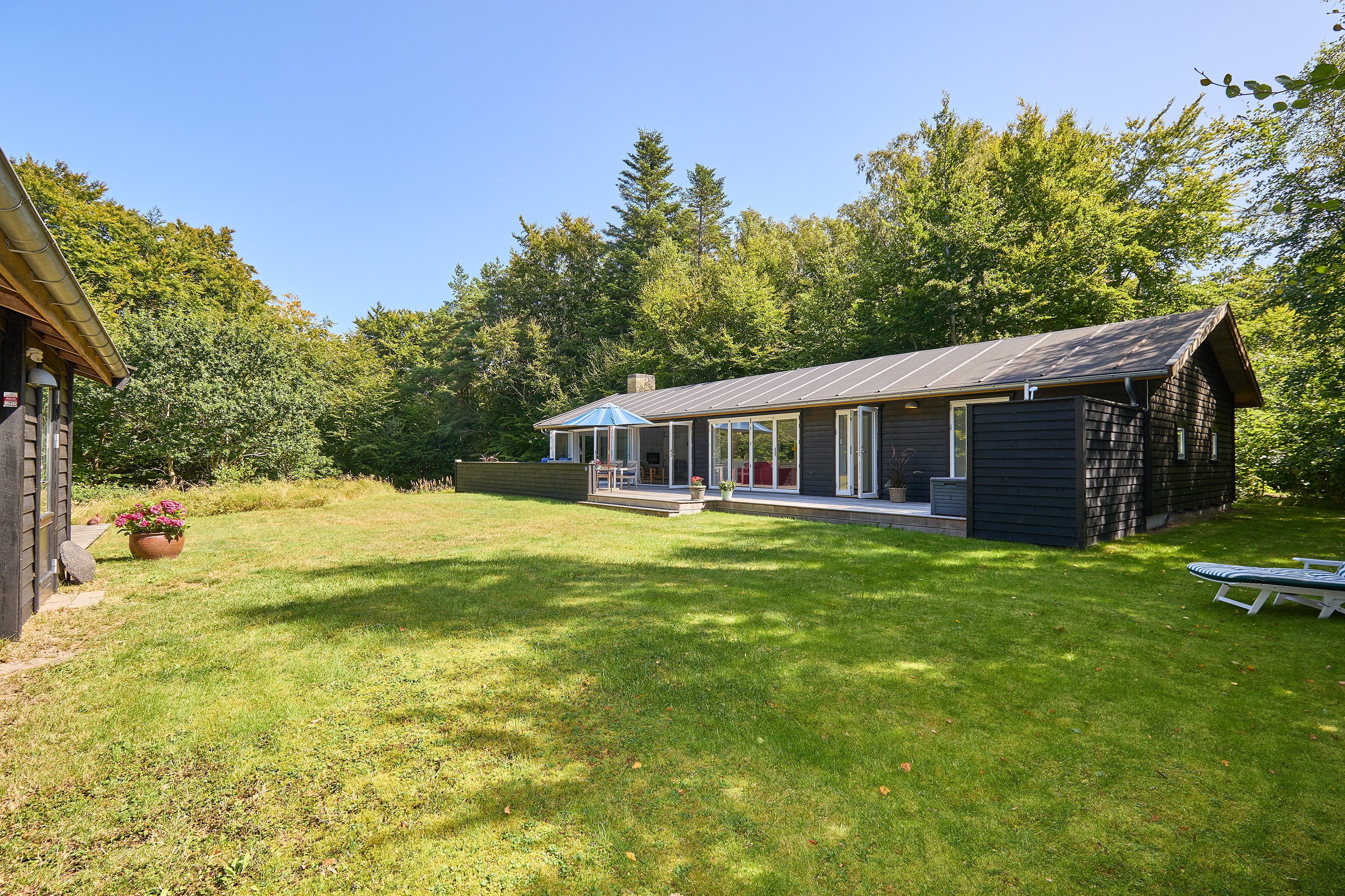 Fremhævet ejendommen billede i fuldskærmstilstand. Billede af Skovbakken 3, Rågeleje, 3210 Vejby