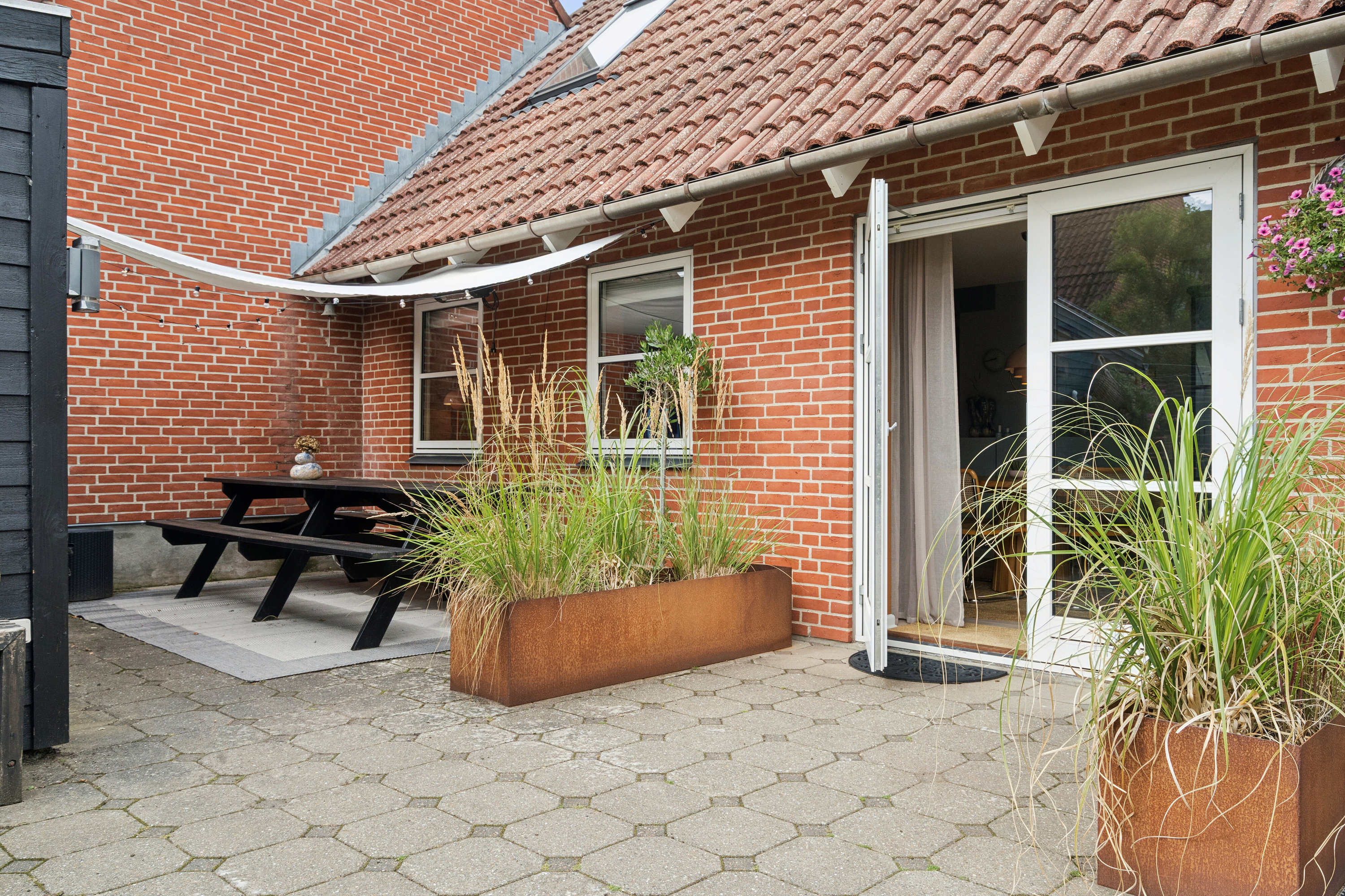 Fremhævet terrasse billede i fuldskærmstilstand. Billede af Krybdalvej 8, 8620 Kjellerup