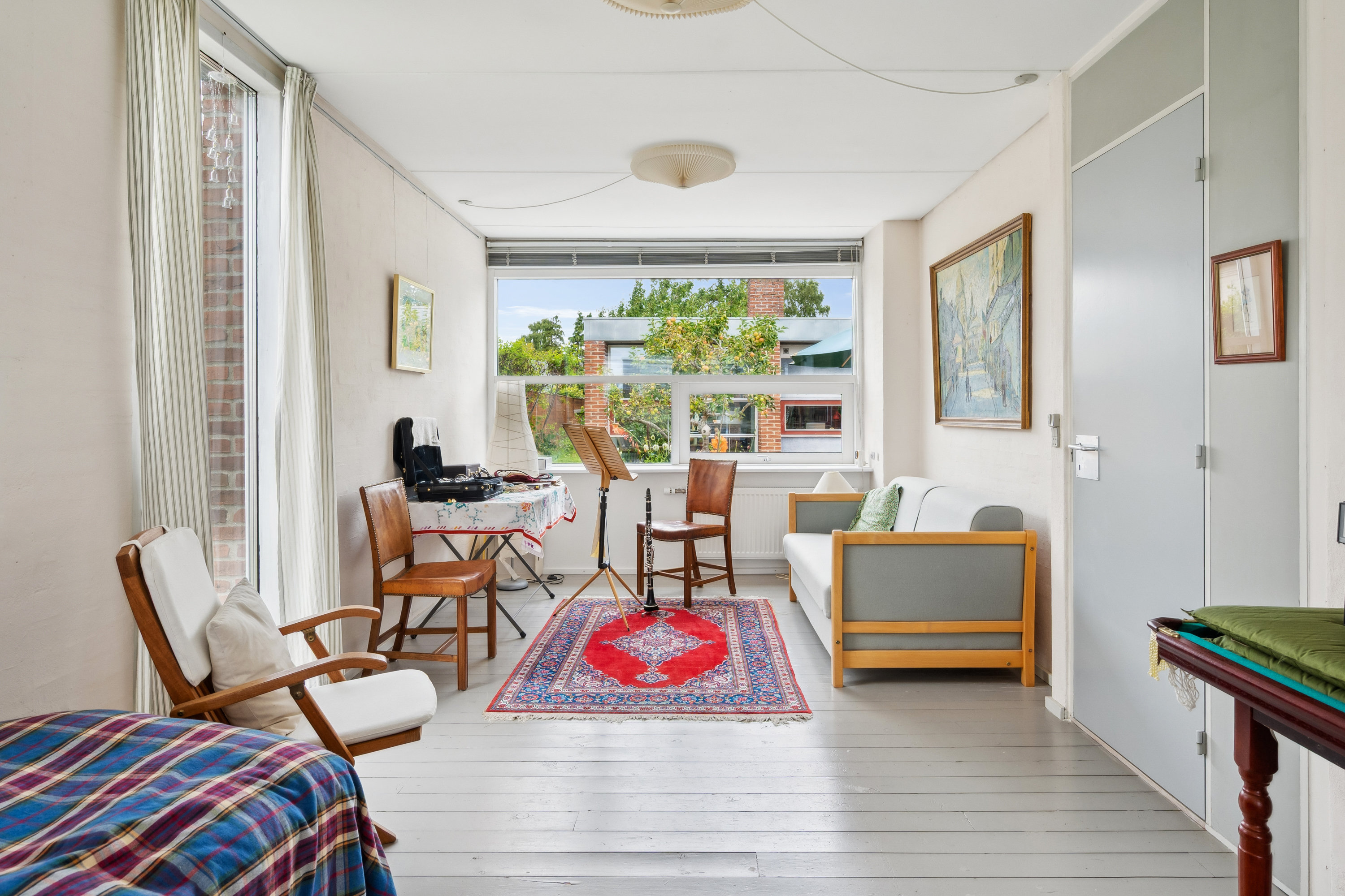 Fremhævet stue billede i fuldskærmstilstand. Billede af Humlevej 19, 8240 Risskov