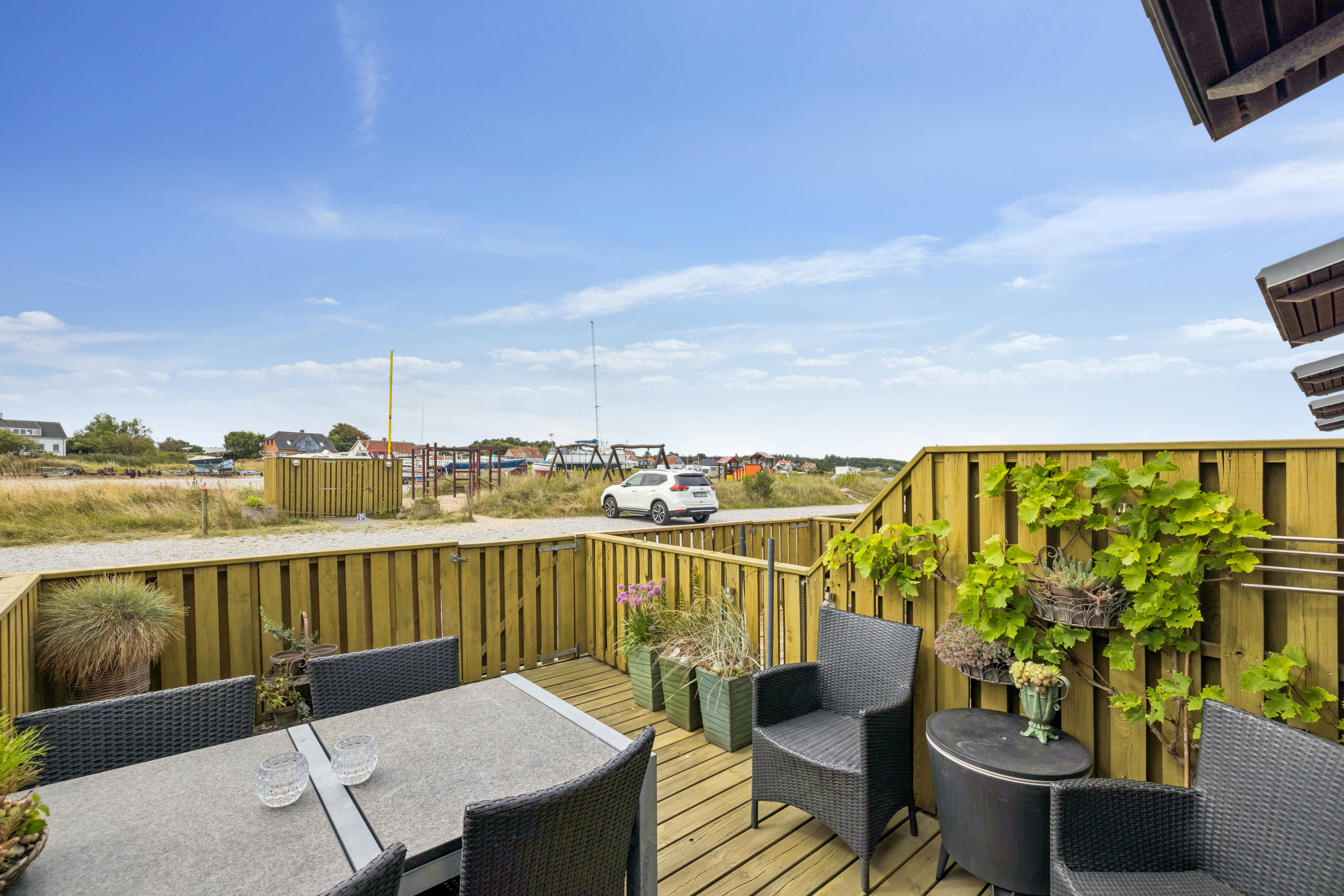 Fremhævet terrasse billede i fuldskærmstilstand. Billede af Vestre Mole 18, Bønnerup Strand, 8585 Glesborg