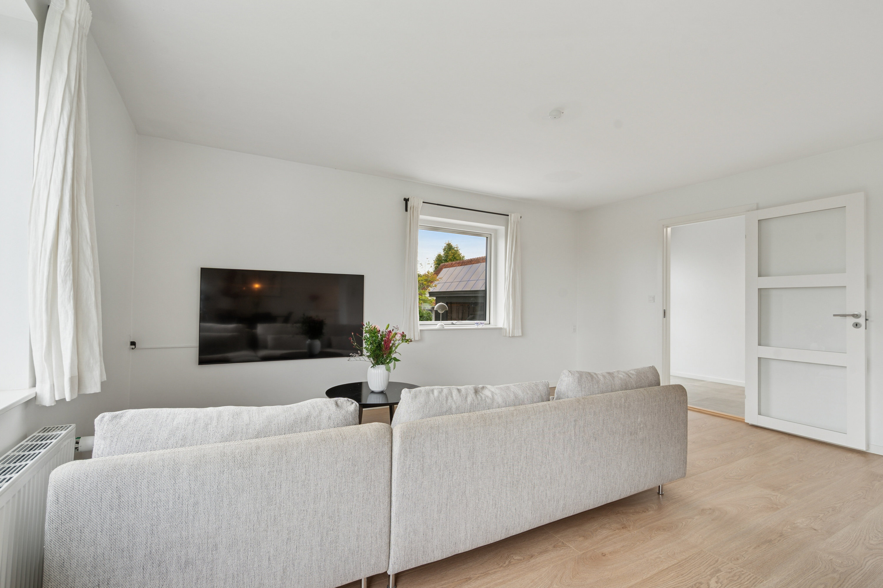 Fremhævet stue billede i fuldskærmstilstand. Billede af Rantzausmindevej 122, 5700 Svendborg