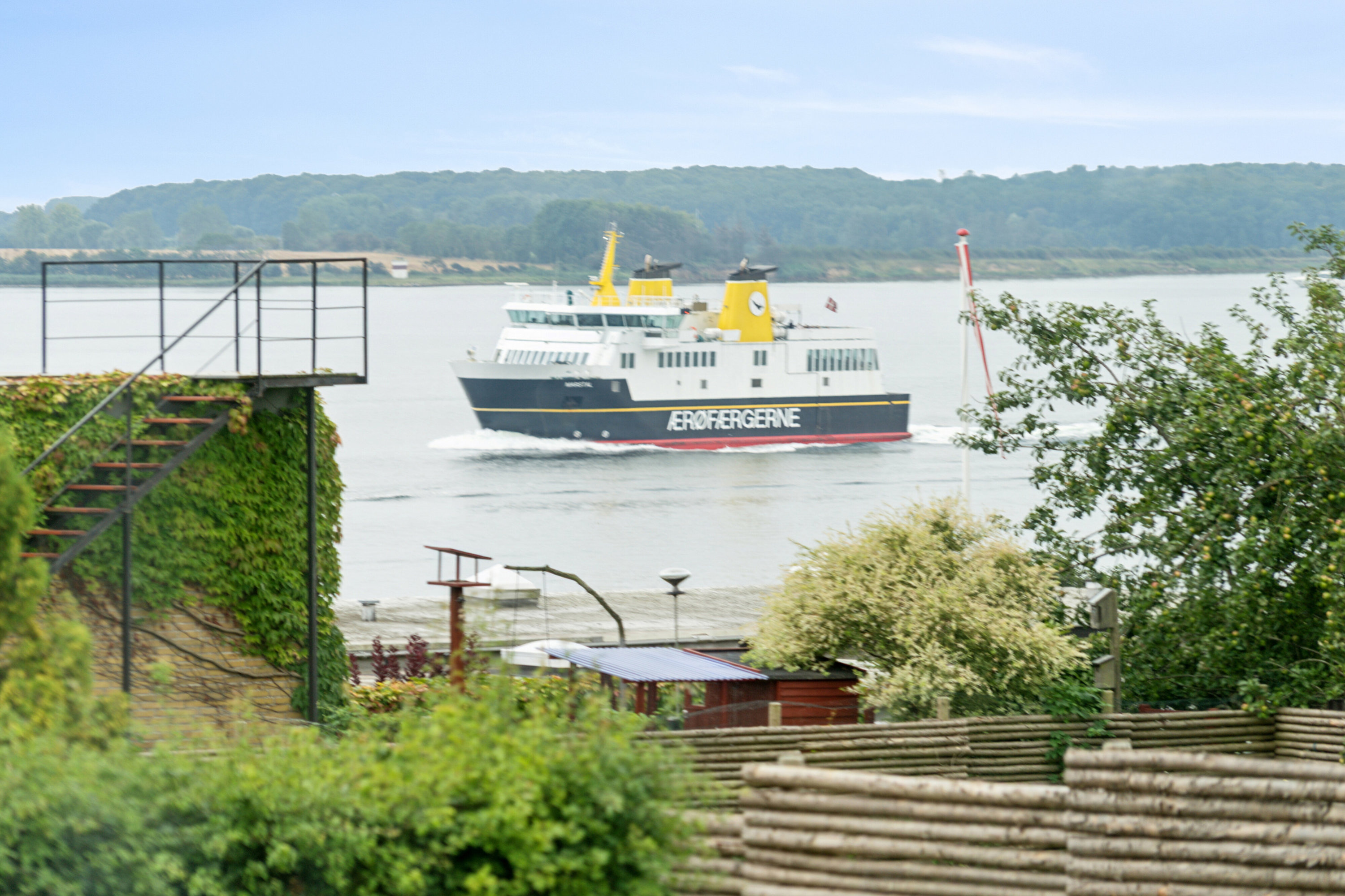 Fremhævet udsigt fra stuen billede i fuldskærmstilstand. Billede af Rantzausmindevej 122, 5700 Svendborg