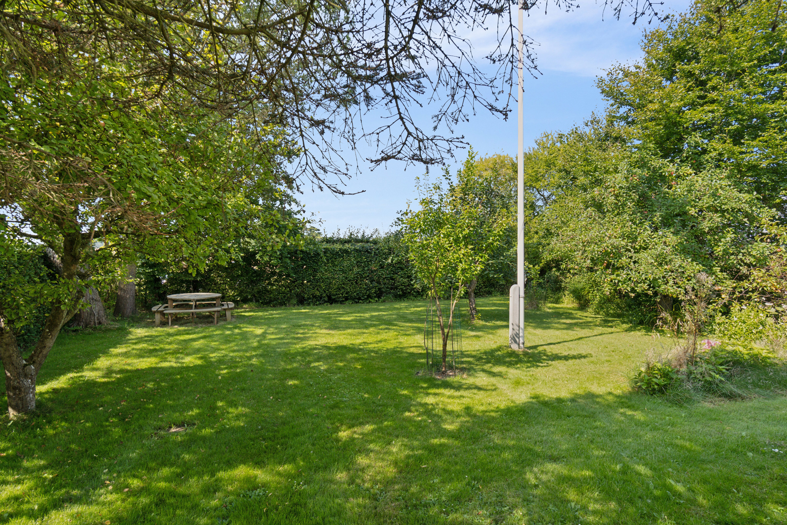 Fremhævet set fra haven billede i fuldskærmstilstand. Billede af Fugleholmvej 4, Hejninge, 4200 Slagelse