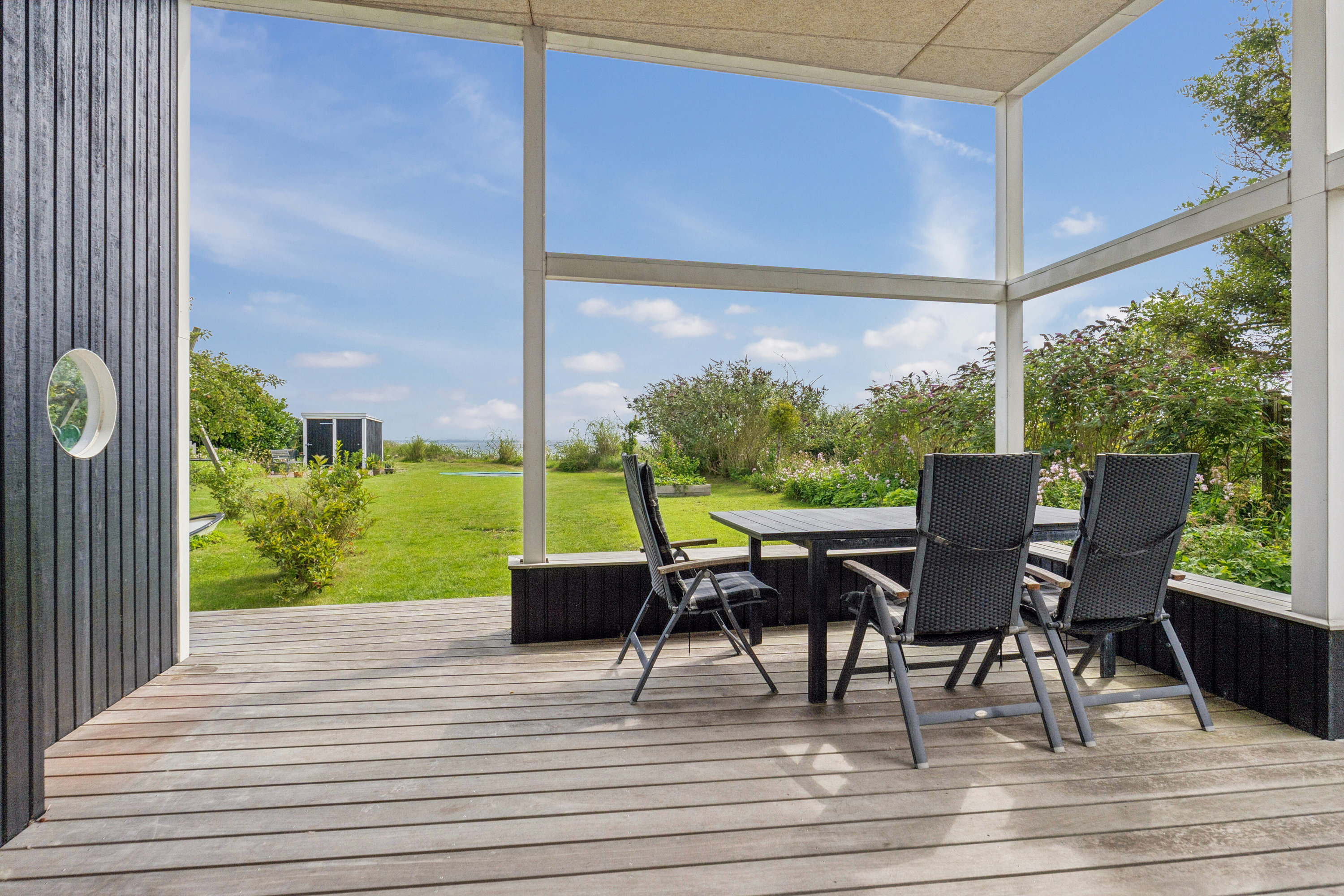 Fremhævet overdækket terrasse billede i fuldskærmstilstand. Billede af Kystvej 27, Lundeborg, 5874 Hesselager