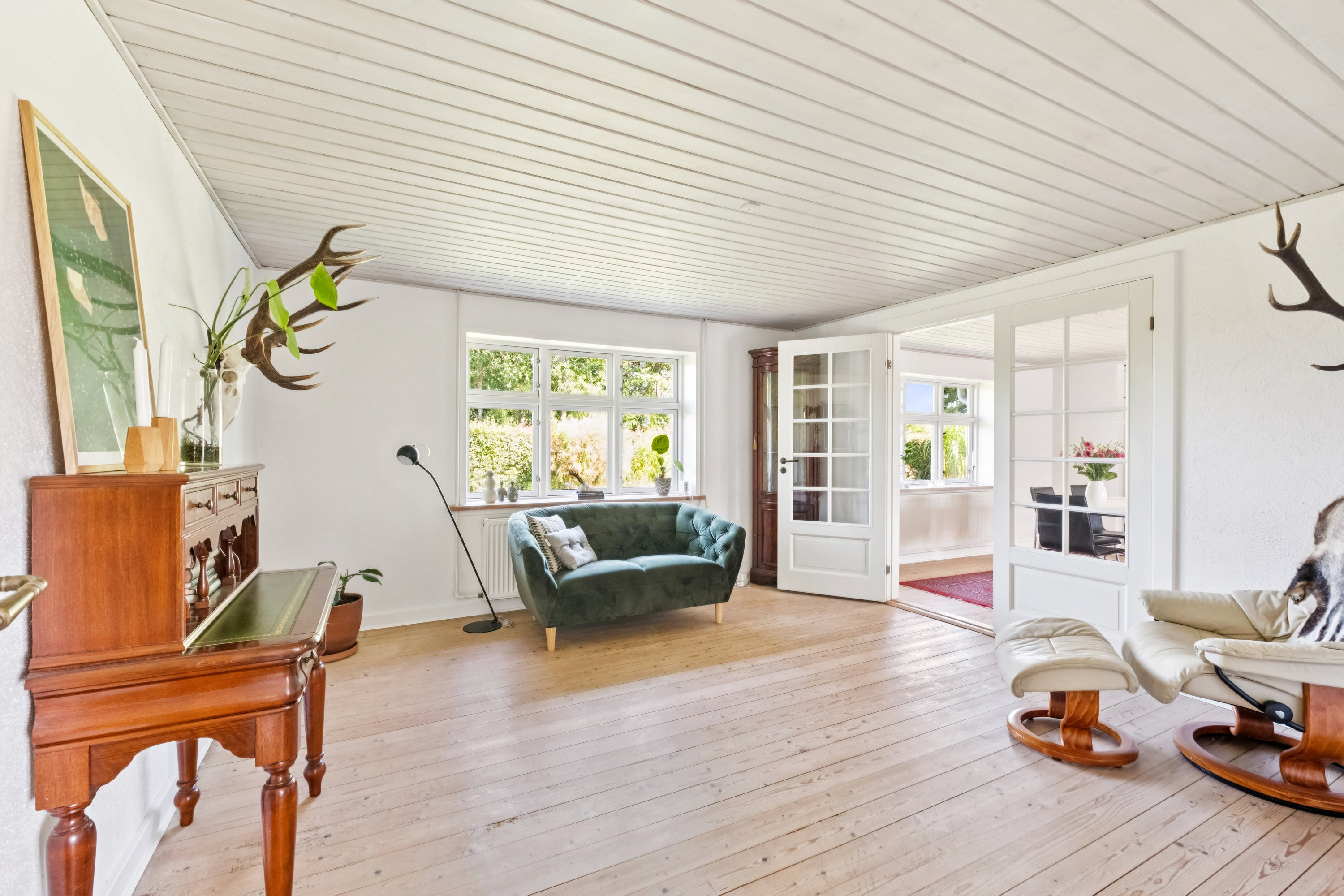 Fremhævet stue billede i fuldskærmstilstand. Billede af Ellidshøj Banevej 27, 9230 Svenstrup J