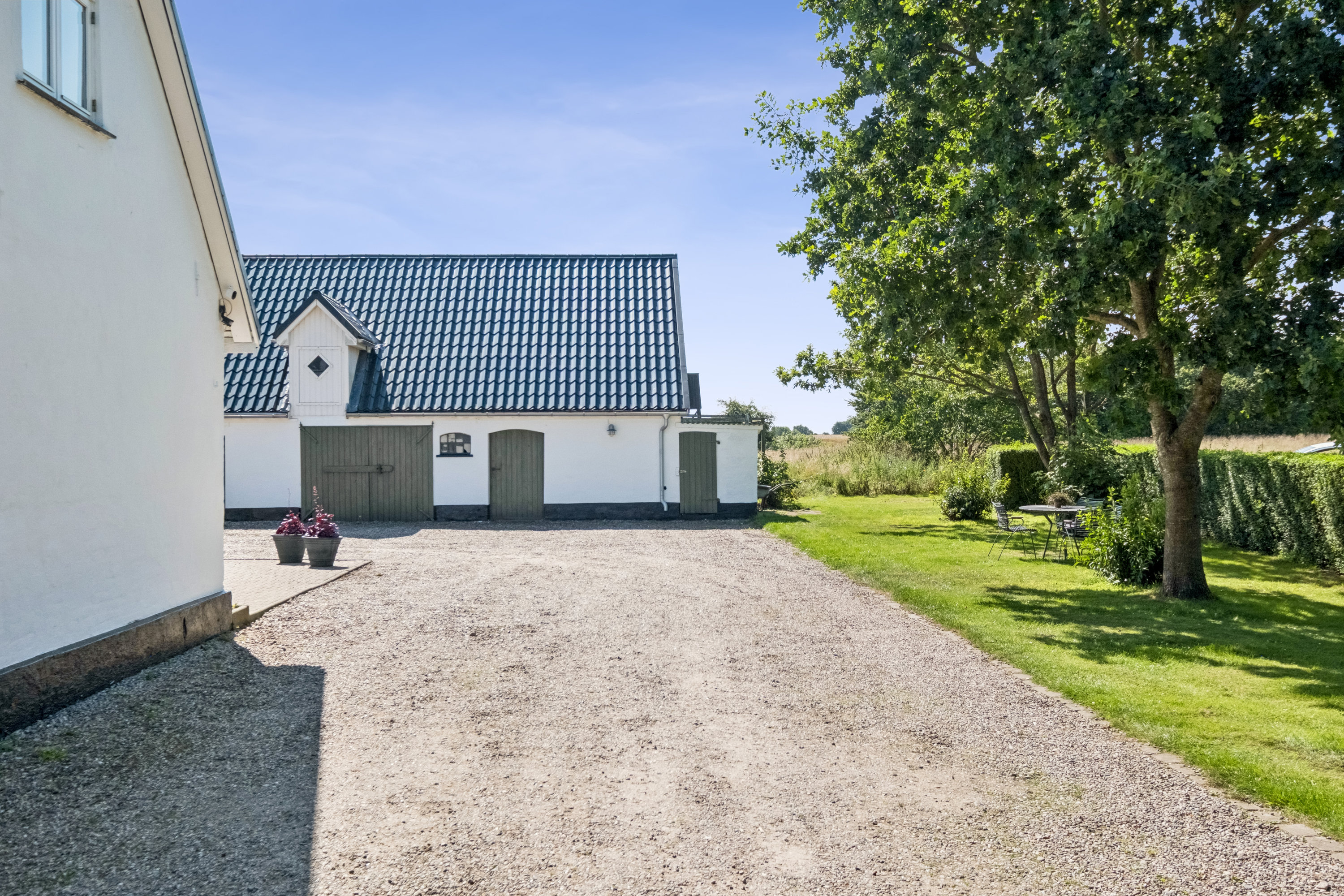 Fremhævet gårdsplads billede i fuldskærmstilstand. Billede af Ellidshøj Banevej 27, 9230 Svenstrup J