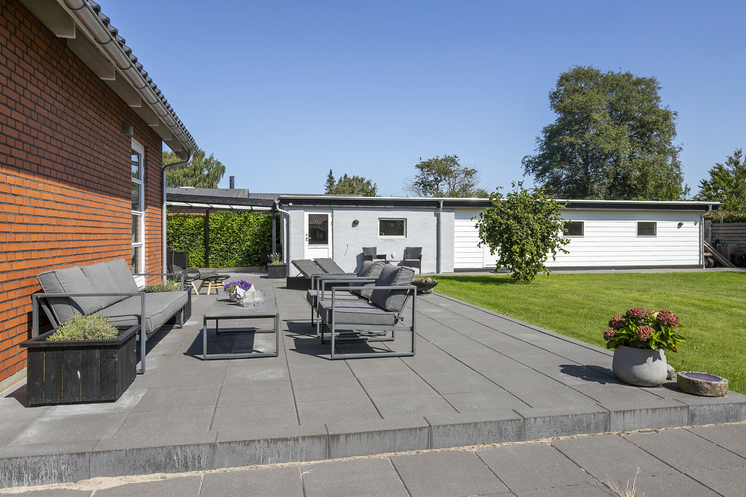 Fremhævet terrasse billede i fuldskærmstilstand. Billede af Smalbyvej 50, 9700 Brønderslev