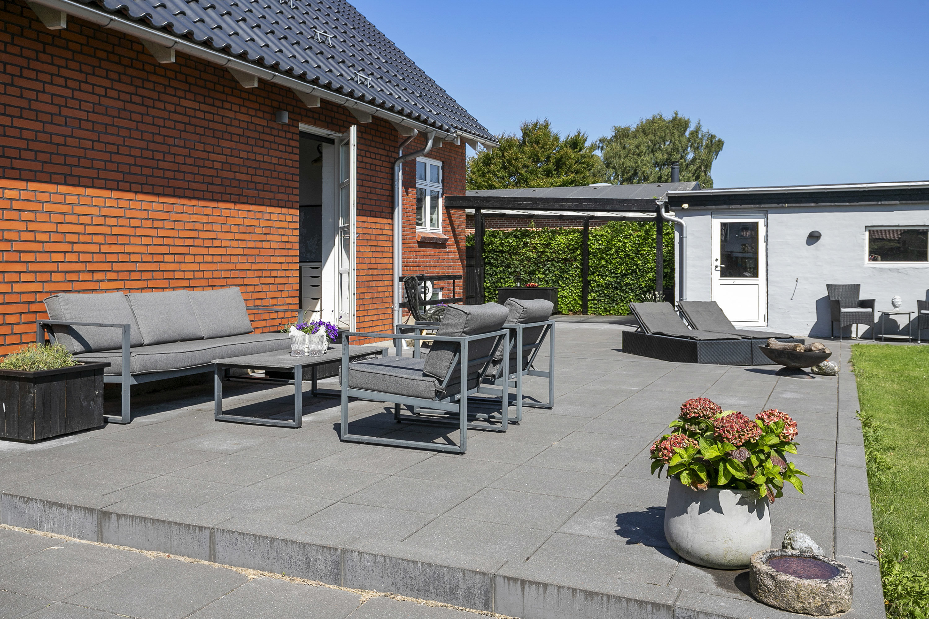 Fremhævet terrasse billede i fuldskærmstilstand. Billede af Smalbyvej 50, 9700 Brønderslev