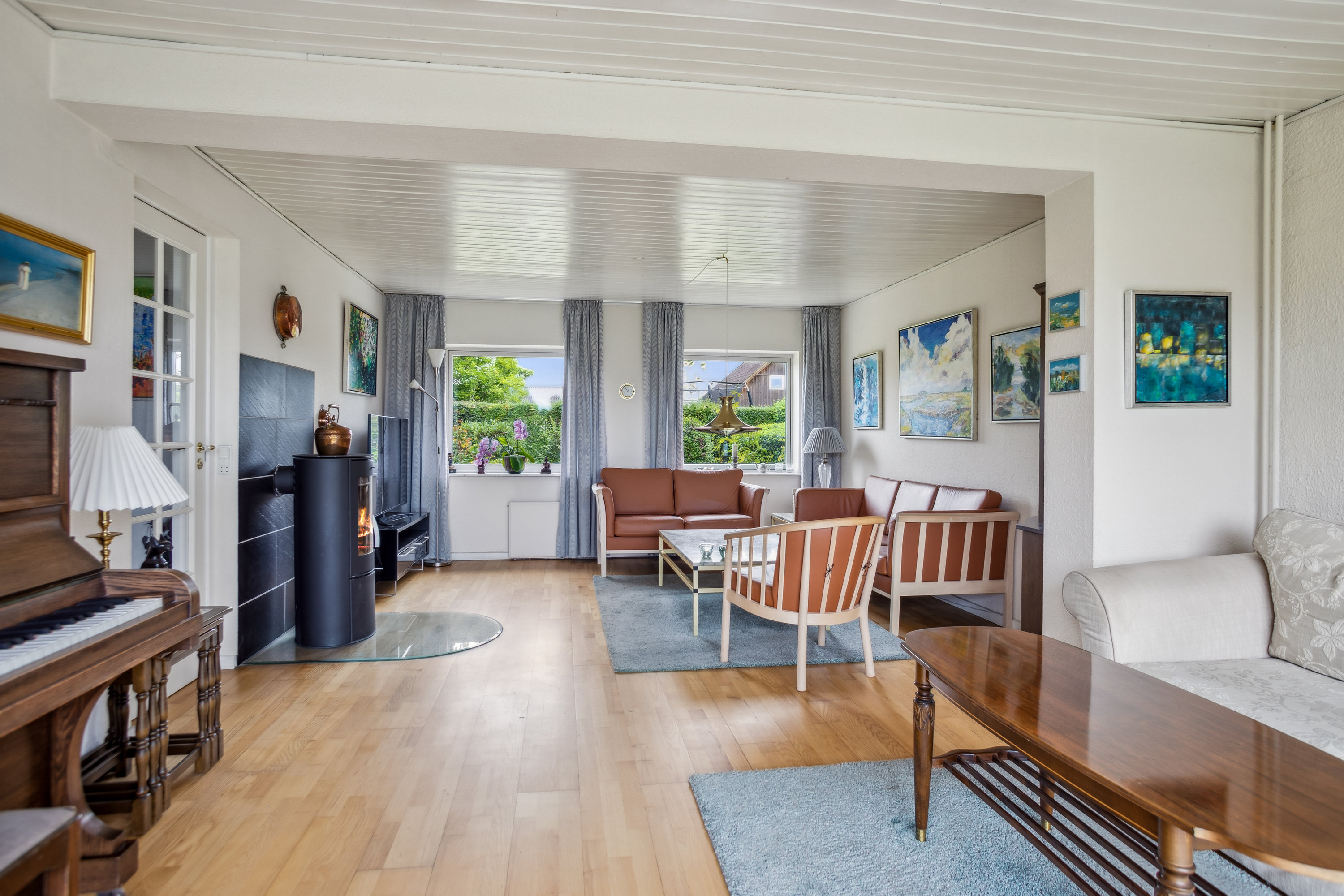 Fremhævet stue billede i fuldskærmstilstand. Billede af Midtervej 22, Sengeløse, 2630 Taastrup