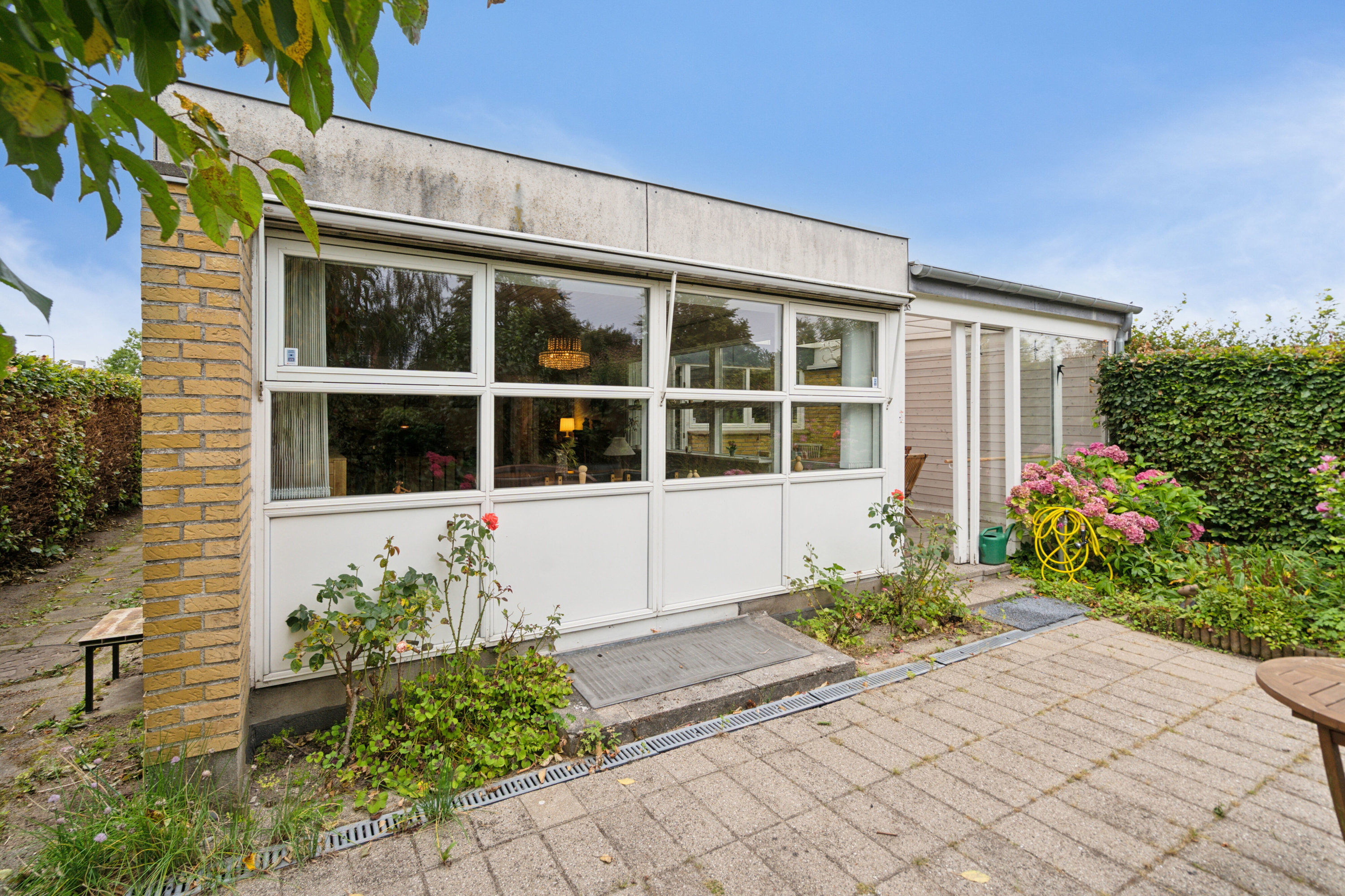 Fremhævet set fra haven billede i fuldskærmstilstand. Billede af Tybrindvænget 16, 5230 Odense M