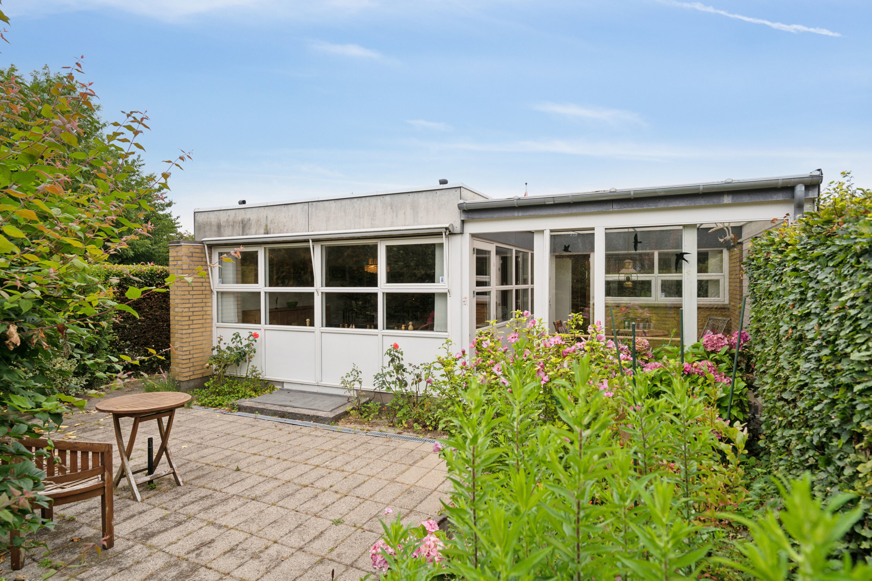 Fremhævet set fra haven billede i fuldskærmstilstand. Billede af Tybrindvænget 16, 5230 Odense M