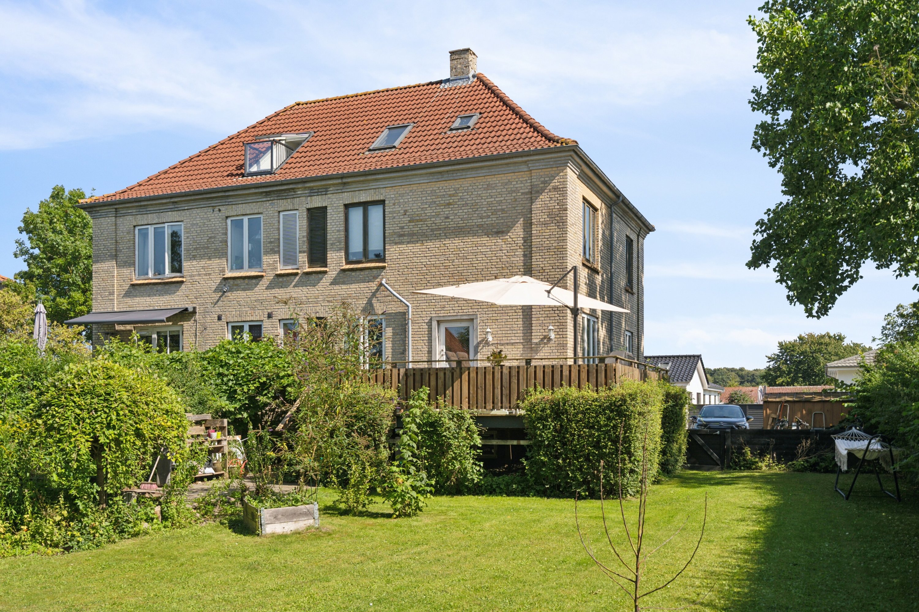 Fremhævet set fra haven billede i fuldskærmstilstand. Billede af Ingeborgvej 18, st.., 5000 Odense C