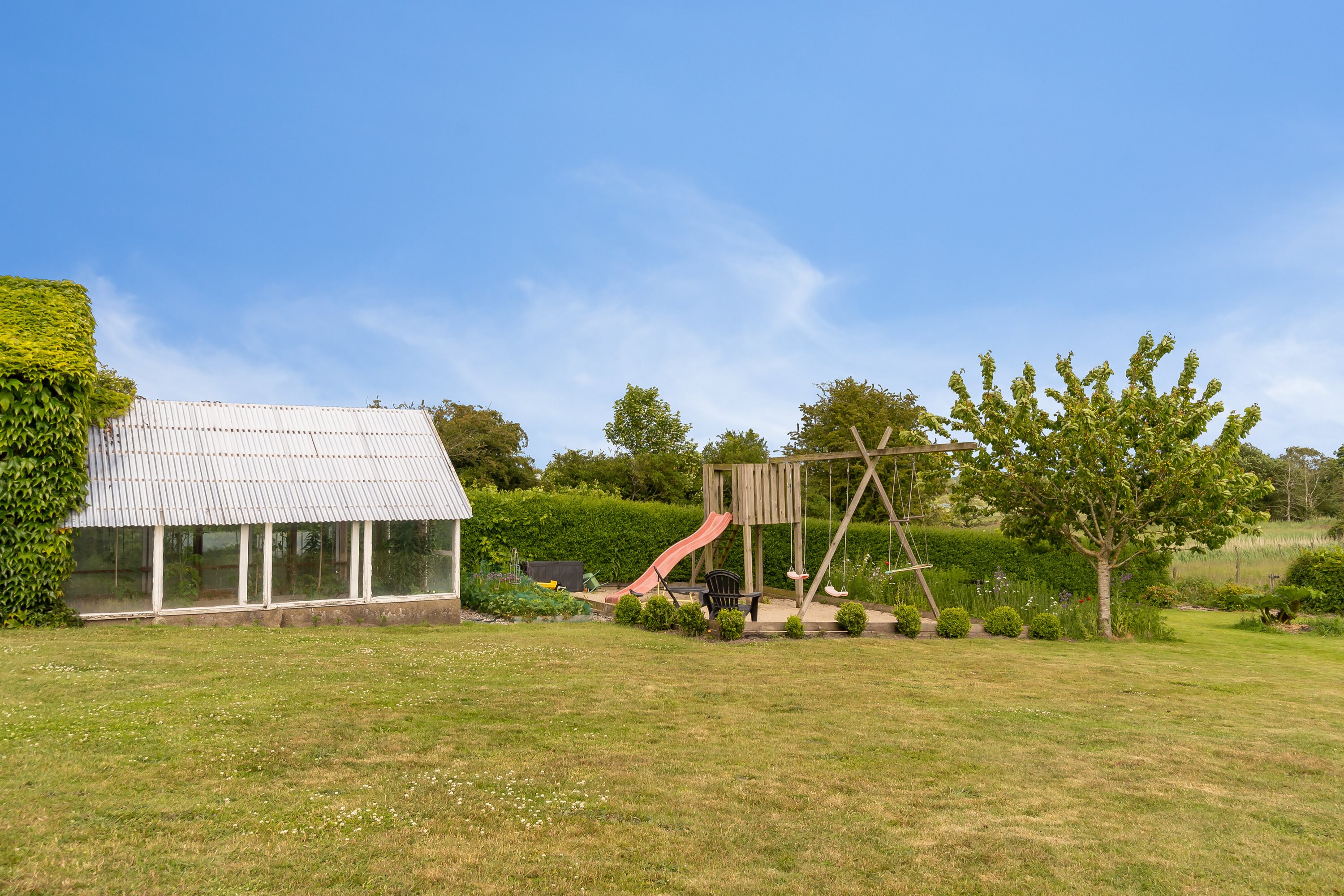 Fremhævet set fra haven billede i fuldskærmstilstand. Billede af Nellemosevej 11, Nellemose, 5683 Haarby