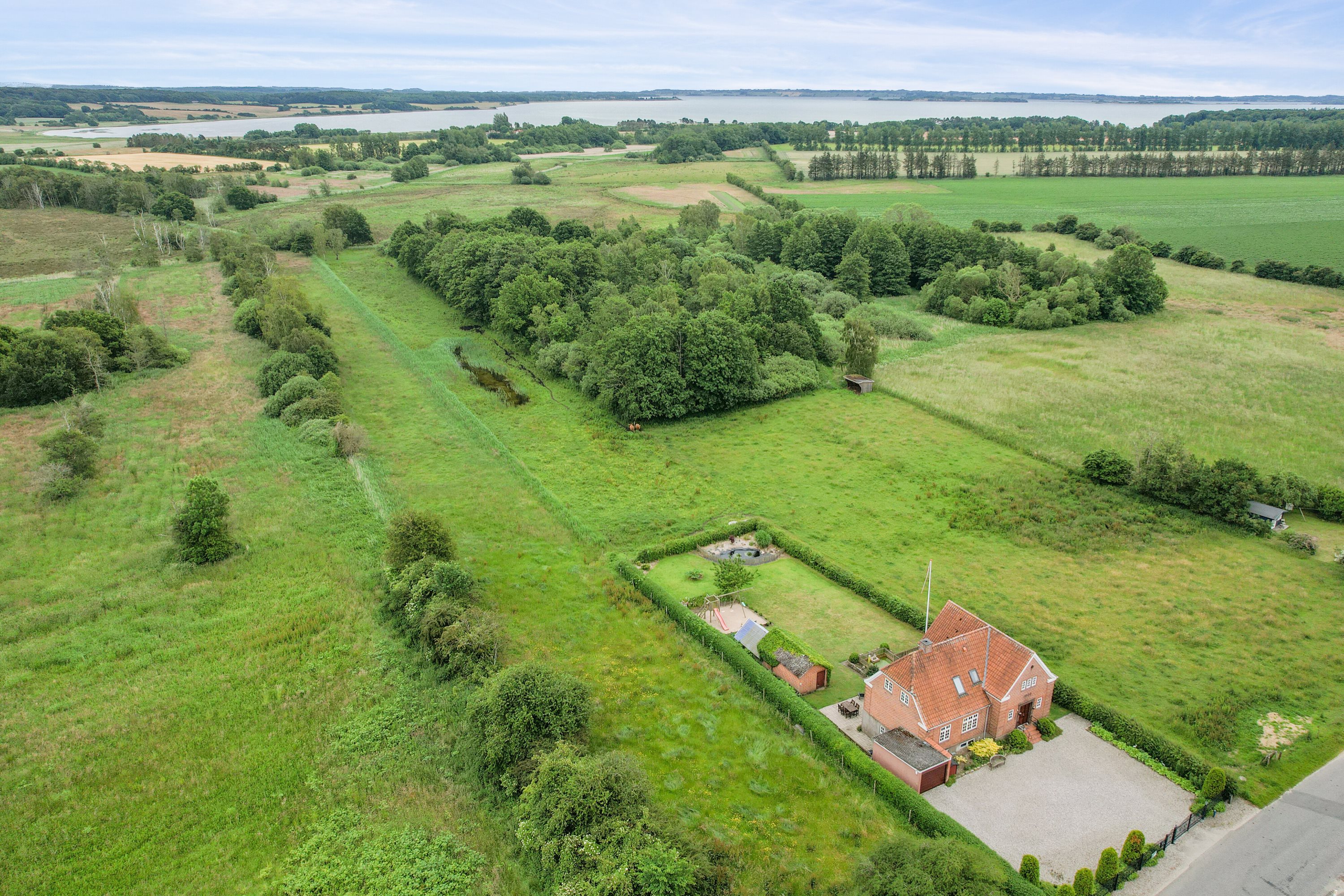 Fremhævet luftfoto billede i fuldskærmstilstand. Billede af Nellemosevej 11, Nellemose, 5683 Haarby