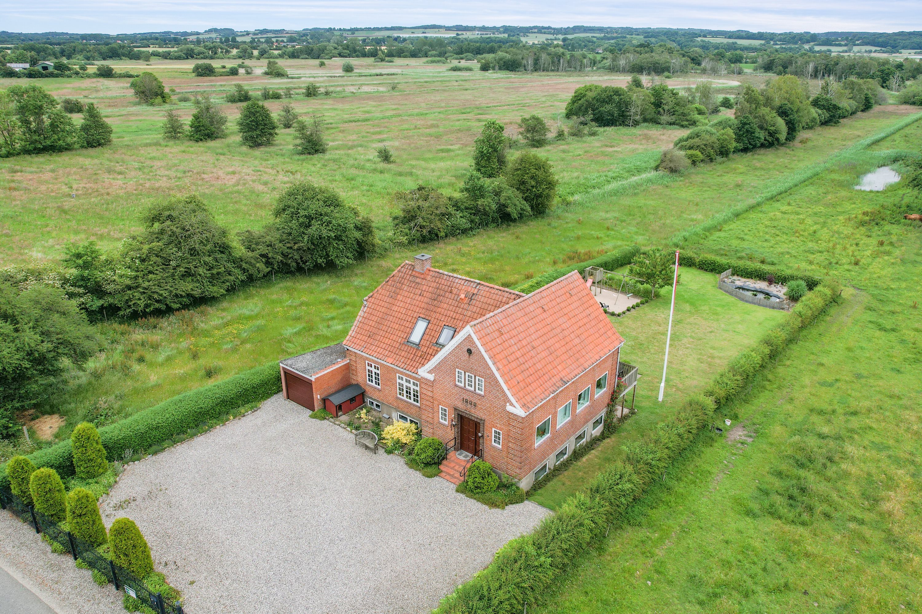 Fremhævet luftfoto billede i fuldskærmstilstand. Billede af Nellemosevej 11, Nellemose, 5683 Haarby
