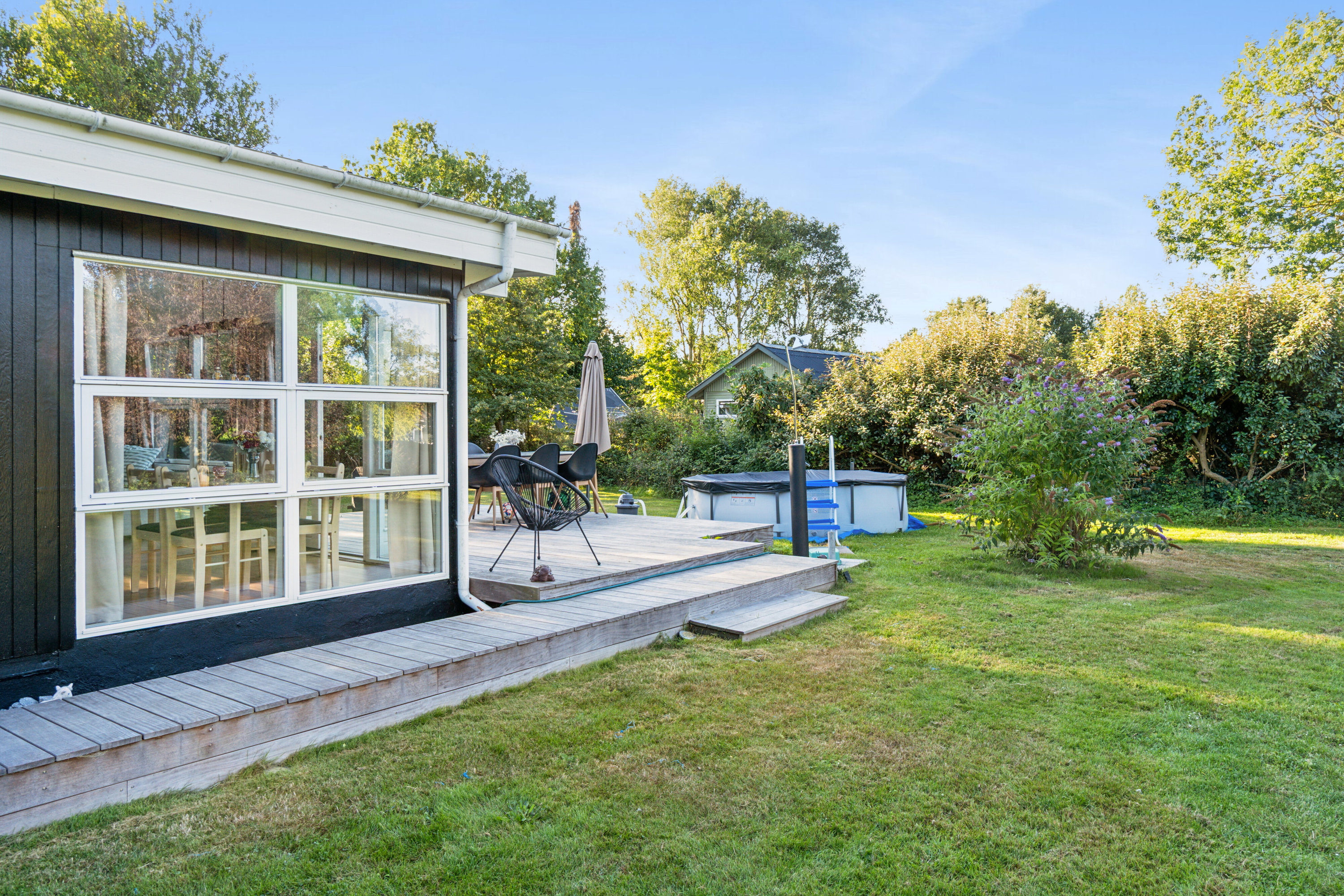 Fremhævet set fra haven billede i fuldskærmstilstand. Billede af Lærkevej 7, Reersø Str, 4281 Gørlev