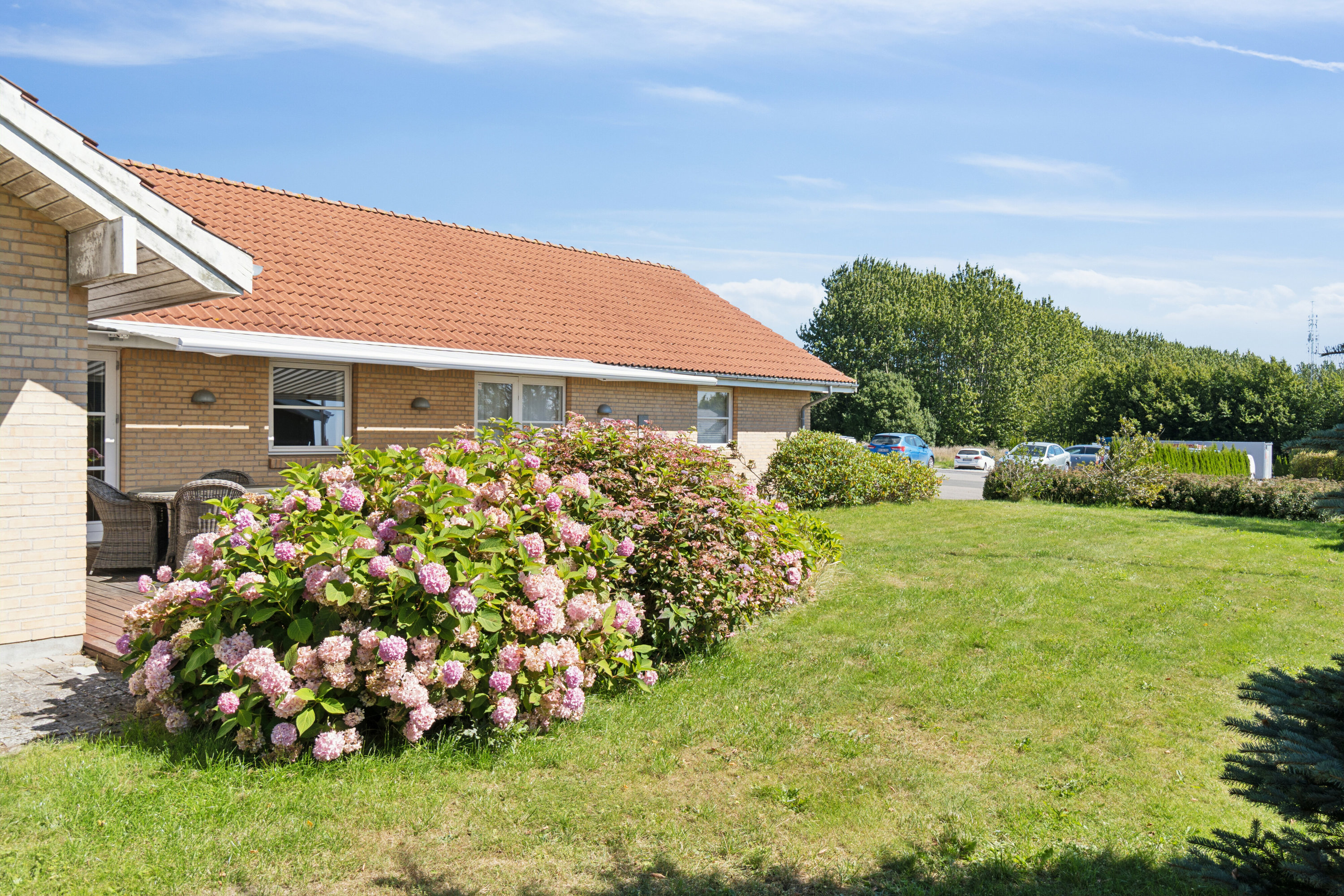 Fremhævet set fra haven billede i fuldskærmstilstand. Billede af Håndværkervænget 3, Sørbymagle, 4200 Slagelse