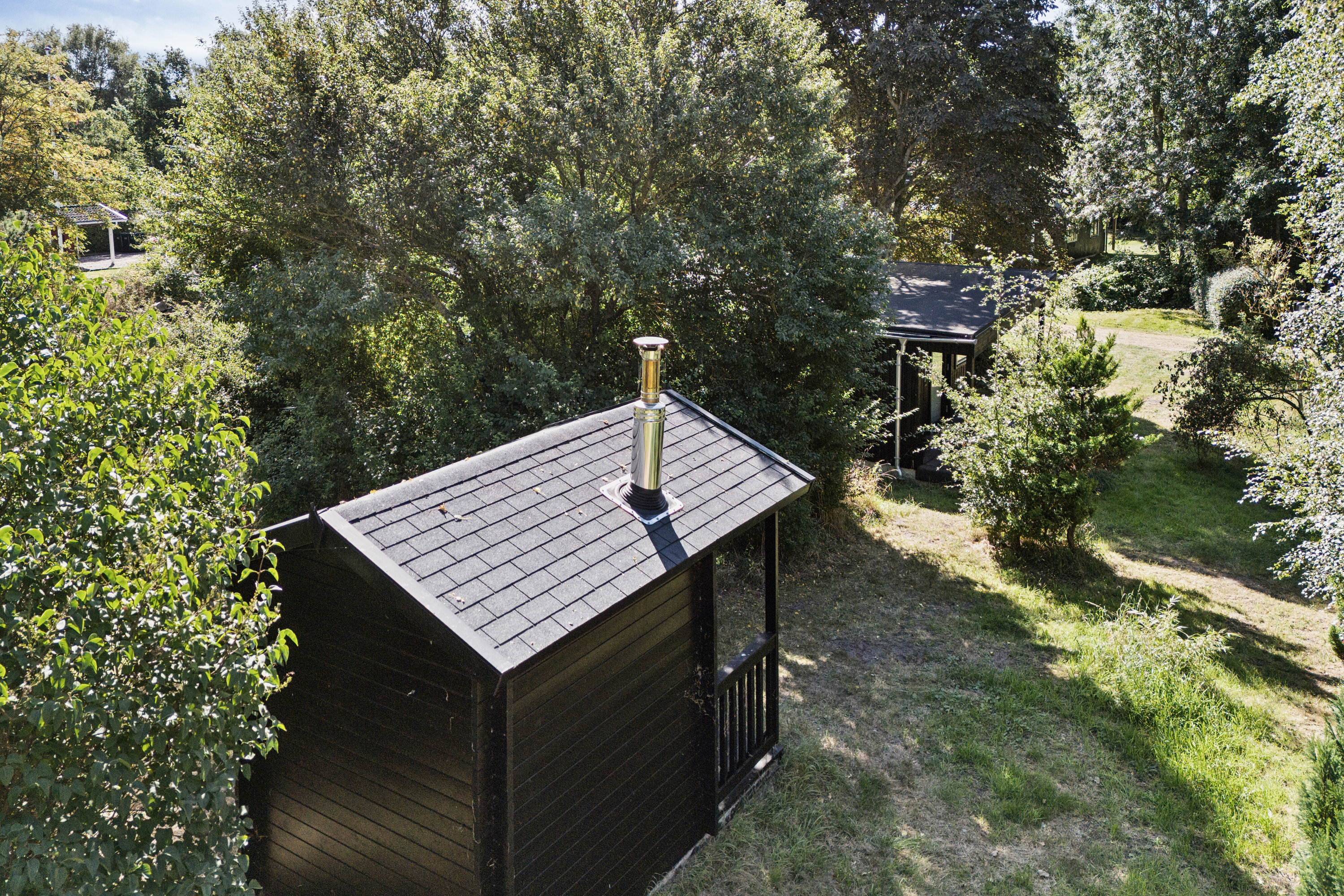 Fremhævet set fra haven billede i fuldskærmstilstand. Billede af Pumavej 20, Overby Lyng, 4583 Sjællands Odde