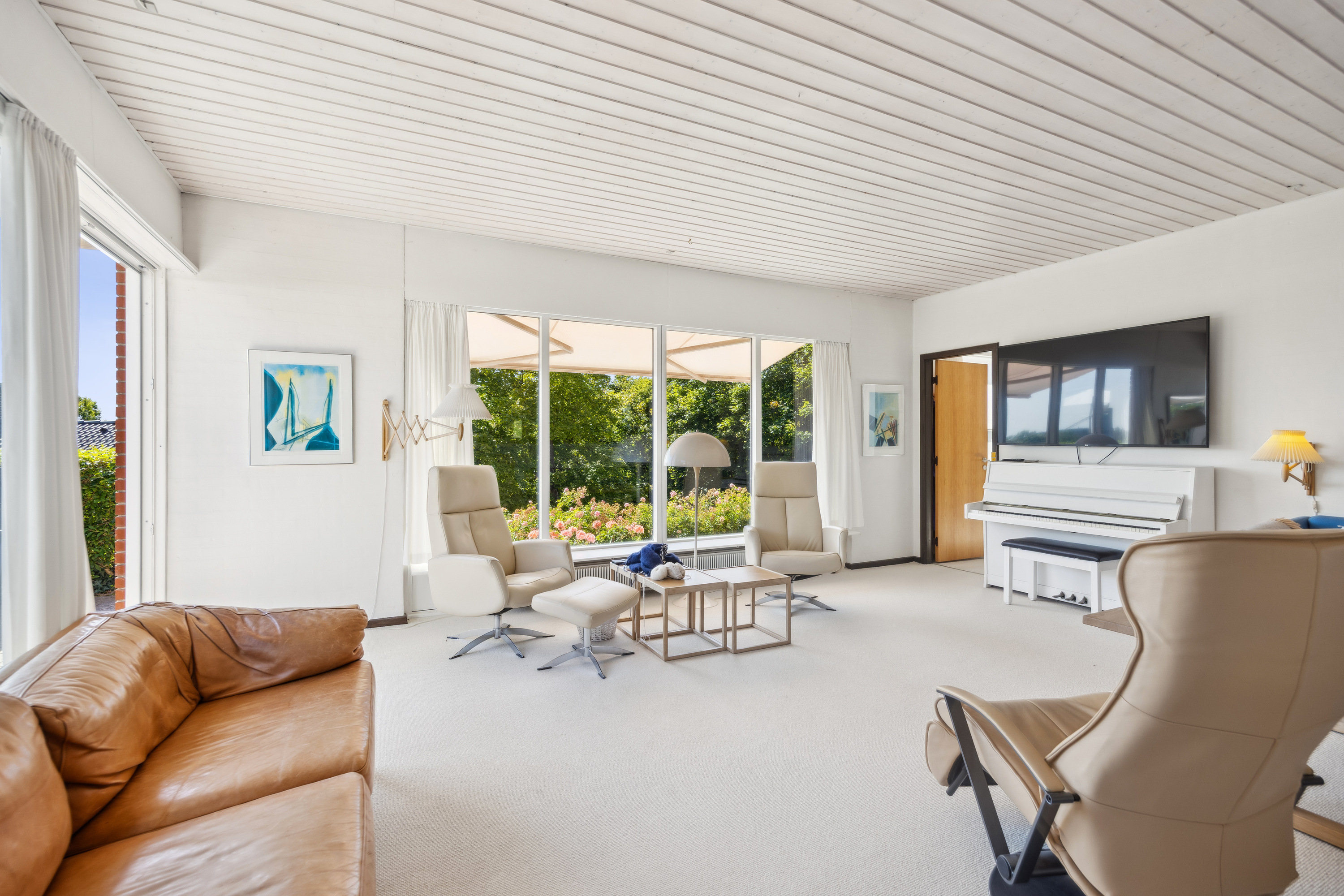 Fremhævet stue billede i fuldskærmstilstand. Billede af Lerkenfeltvej 13, 9200 Aalborg SV