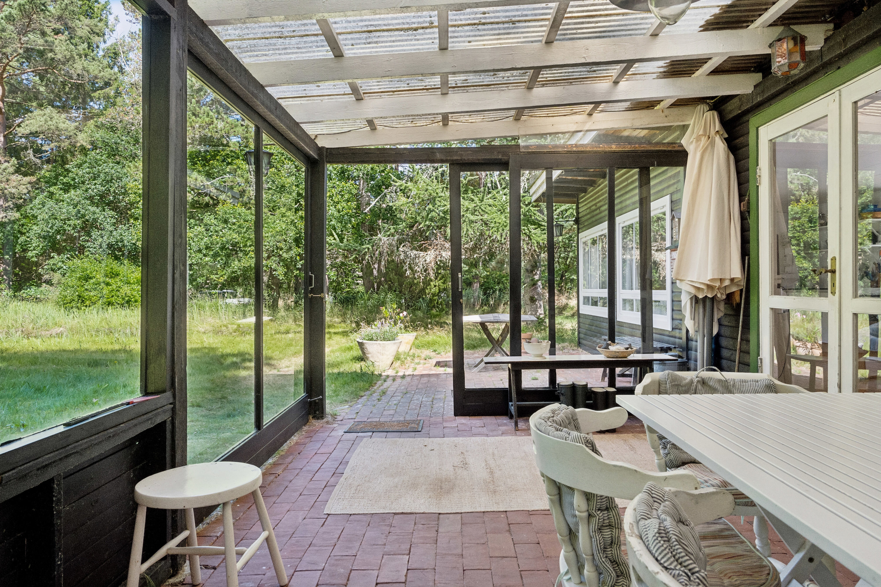 Fremhævet overdækket terrasse billede i fuldskærmstilstand. Billede af Kaprifolievej 11, 4581 Rørvig