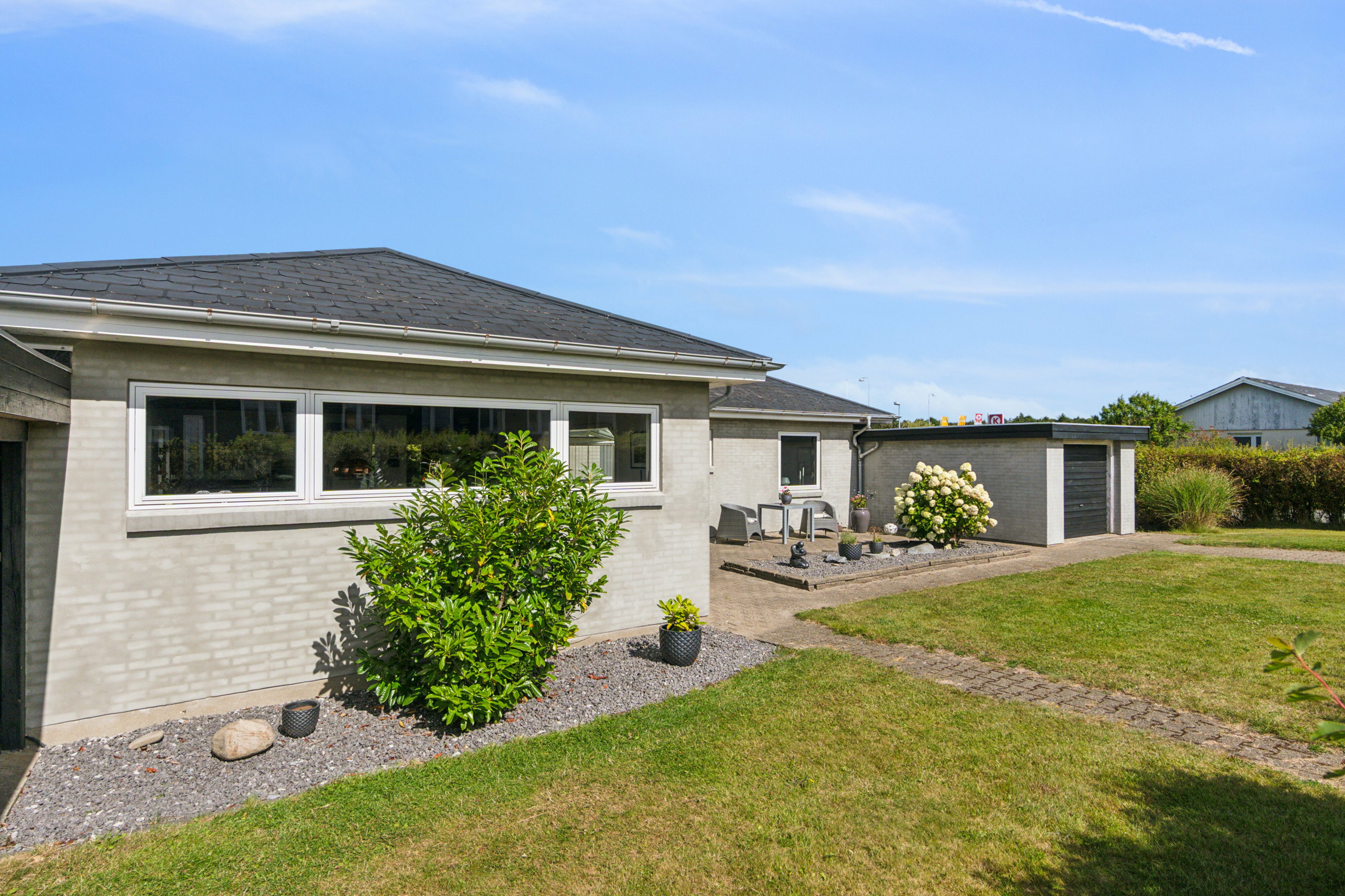 Fremhævet set fra haven billede i fuldskærmstilstand. Billede af Fresiavænget 2, 7730 Hanstholm