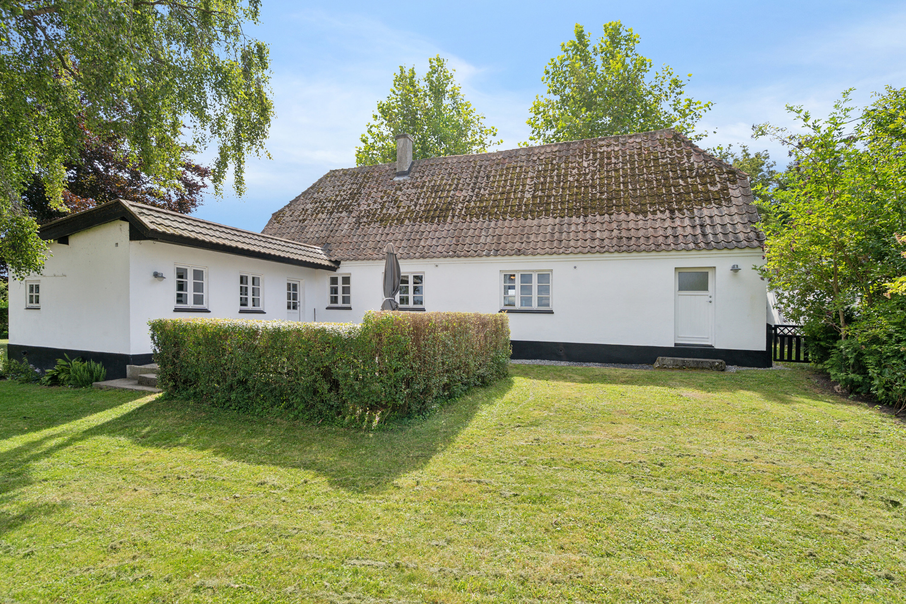 Fremhævet set fra haven billede i fuldskærmstilstand. Billede af Kildemosevej 21, Illebølle, 5900 Rudkøbing