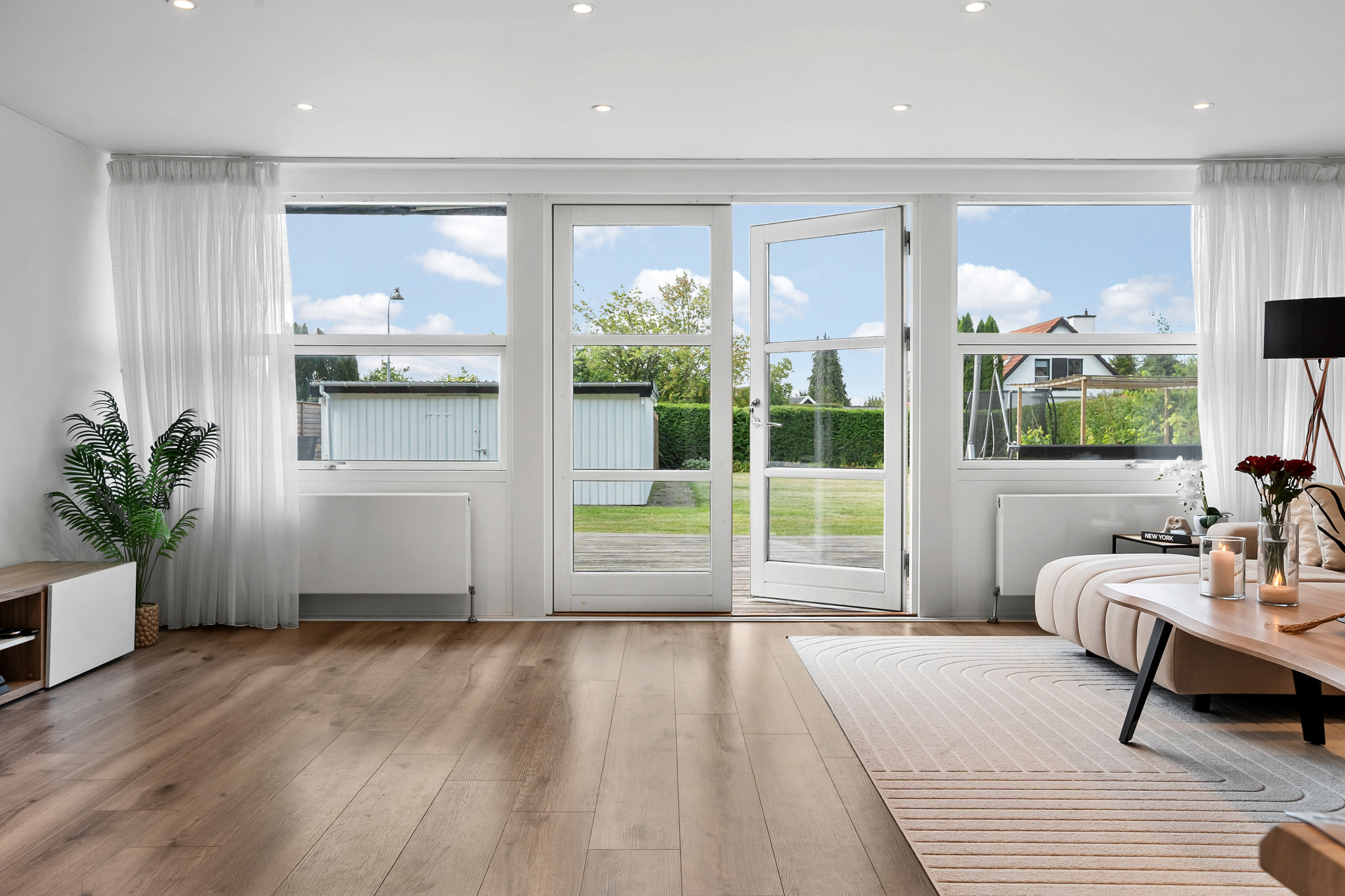 Fremhævet stue billede i fuldskærmstilstand. Billede af Roasvej 50, 2750 Ballerup