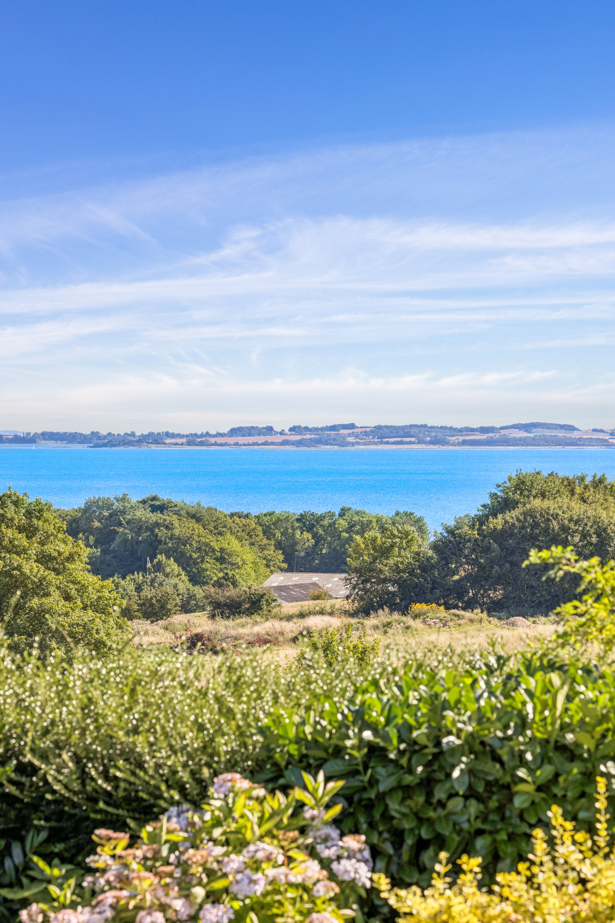 Fremhævet luftfoto billede i fuldskærmstilstand. Billede af Rosenhøjvej 7, Ugelbølle, 8410 Rønde