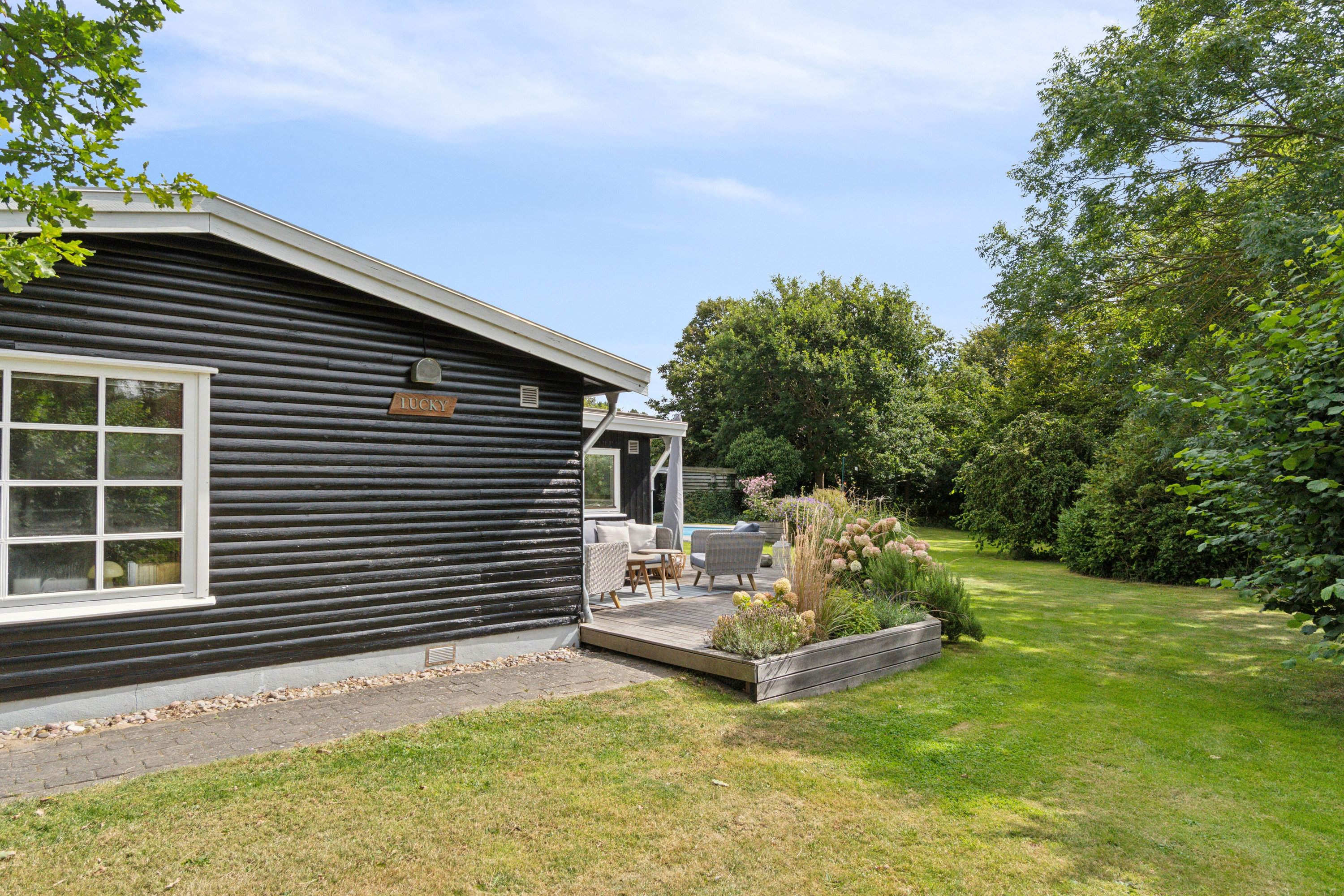 Fremhævet set fra haven billede i fuldskærmstilstand. Billede af Klintevej 28, Hald Strand, 3390 Hundested