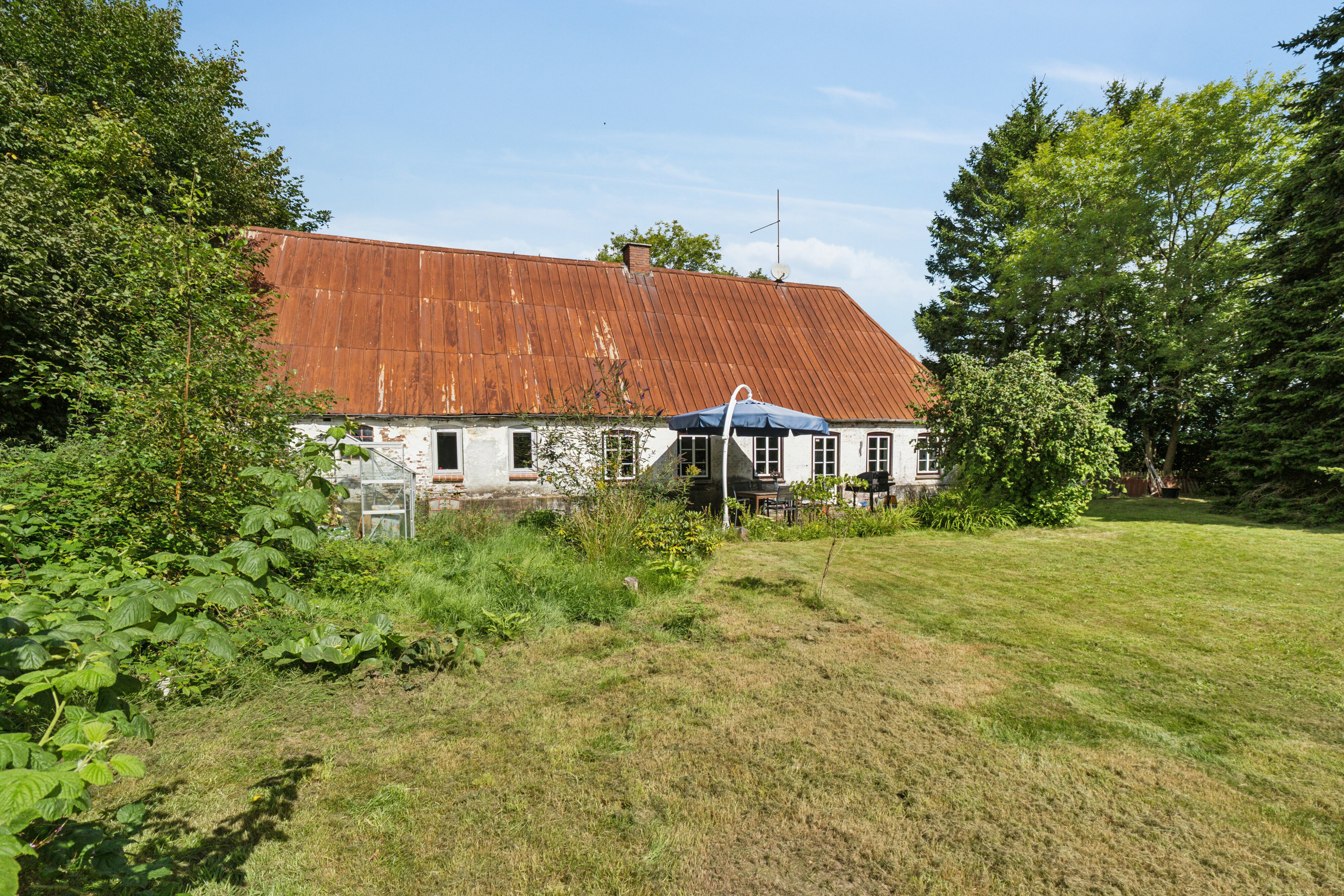 Fremhævet set fra haven billede i fuldskærmstilstand. Billede af Nørremark 1, Sdr Hygum, 6630 Rødding