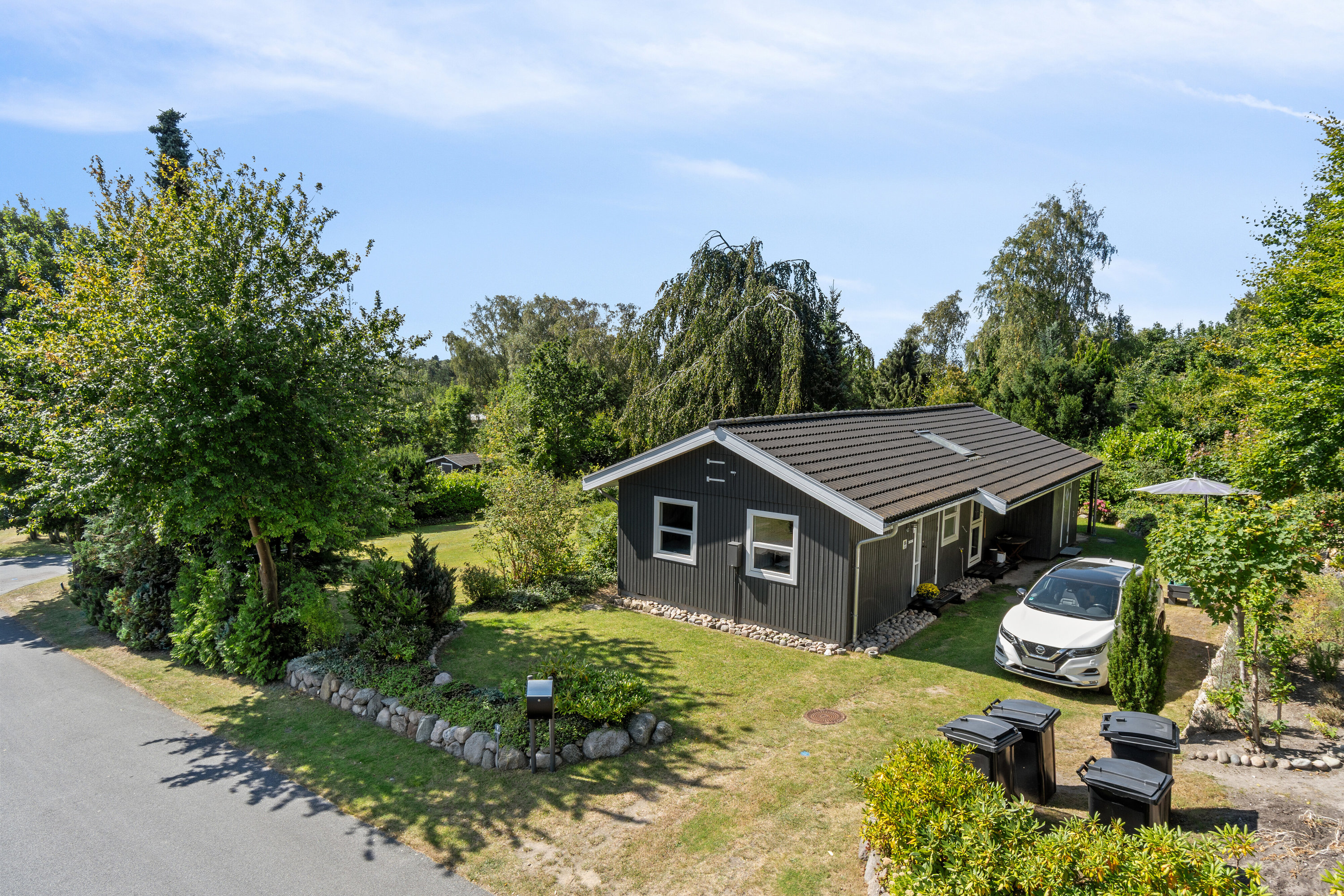 Fremhævet set fra vejen billede i fuldskærmstilstand. Billede af Petrine Sonnesvej 9, Evetofte, 3370 Melby